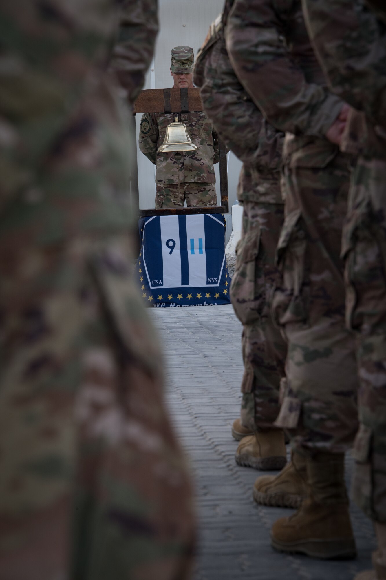 U.S. Airmen, Soldiers and coalition partners from the from the 380th Air Expeditionary Wing honored first responders who died in the line of duty during the terrorist attack on the World Trade Center during a retreat ceremony at Al Dhafra Air Base, United Arab Emirates, Sept. 11, 2018.  (U.S. Air Force photo by Tech. Sgt. Nieko Carzis)
