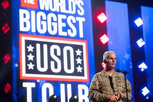 Air Force Gen. Paul J. Selva, vice chairman of the Joint Chiefs of Staff, addresses service members from a stage.
