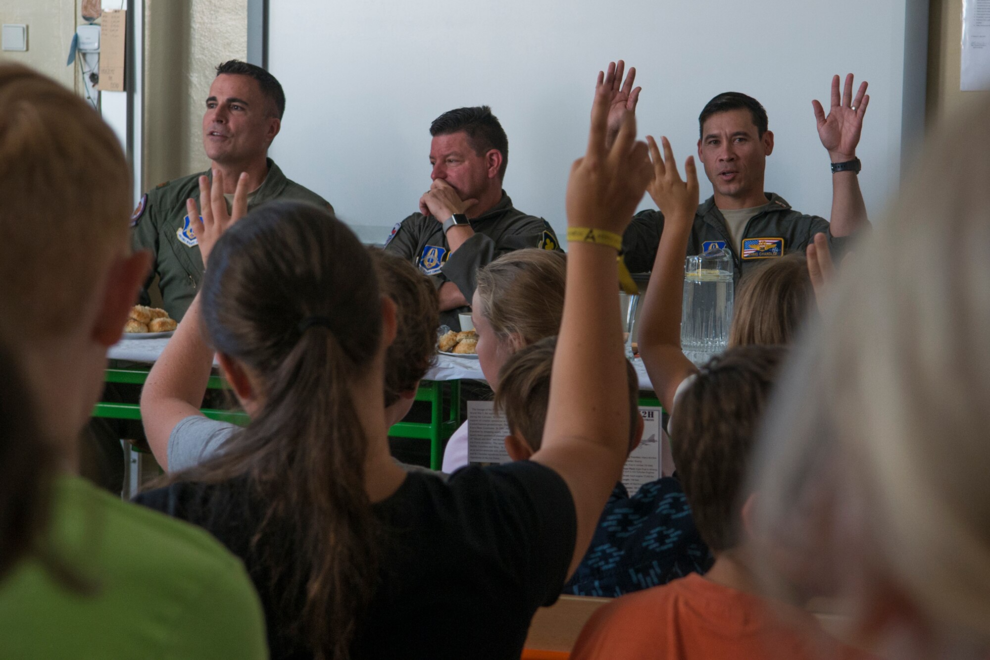 A U.S. Air Force Reserve aircrew assigned to the 307th Bomb Wing at Barksdale Air Force Base, La., answer questions from students at the General Zdenek Skarvada elementary school on Sept. 12, 2018, Ostrava, Czech Republic. The Airmen in Ostrava to support the NATO Days airshow and to communicate to U.S. and European partners defense and promote regional interoperability, security, and relations. (U.S. Air Force photo by Master Sgt. Greg Steele)