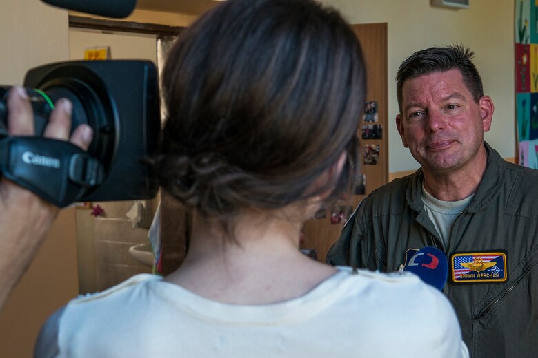 U.S. Air Force Reserve Lt. Col. Shawn Werchan is interviewed by local media at the General Zdenek Skarvada elementary school on Sept. 12, 2018, Ostrava, Czech Republic. Werchan is a B-52H Stratofortress pilot assigned to the Air Force Reserve 307th Bomb Wing and is in Ostrava to support the NATO Days airshow. (U.S. Air Force photo by Master Sgt. Greg Steele)