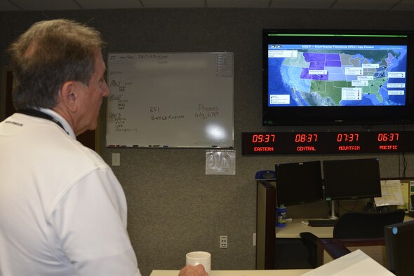 Rodney Simmons, Air Forces Northern National Security Emergency Preparedness Director, receives a briefing about the status of Emergency Preparedness Liaison Officers deployed ahead of Hurricane Florence landfall on the U.S. southeastern coast. Deploying EPLOs is one of the ways the Air Forces Northern enterprise assists U.S. Northern Command’s support of the Federal Emergency Management Agency’s response efforts for Hurricane Florence. (Air Force photo by Mary McHale)