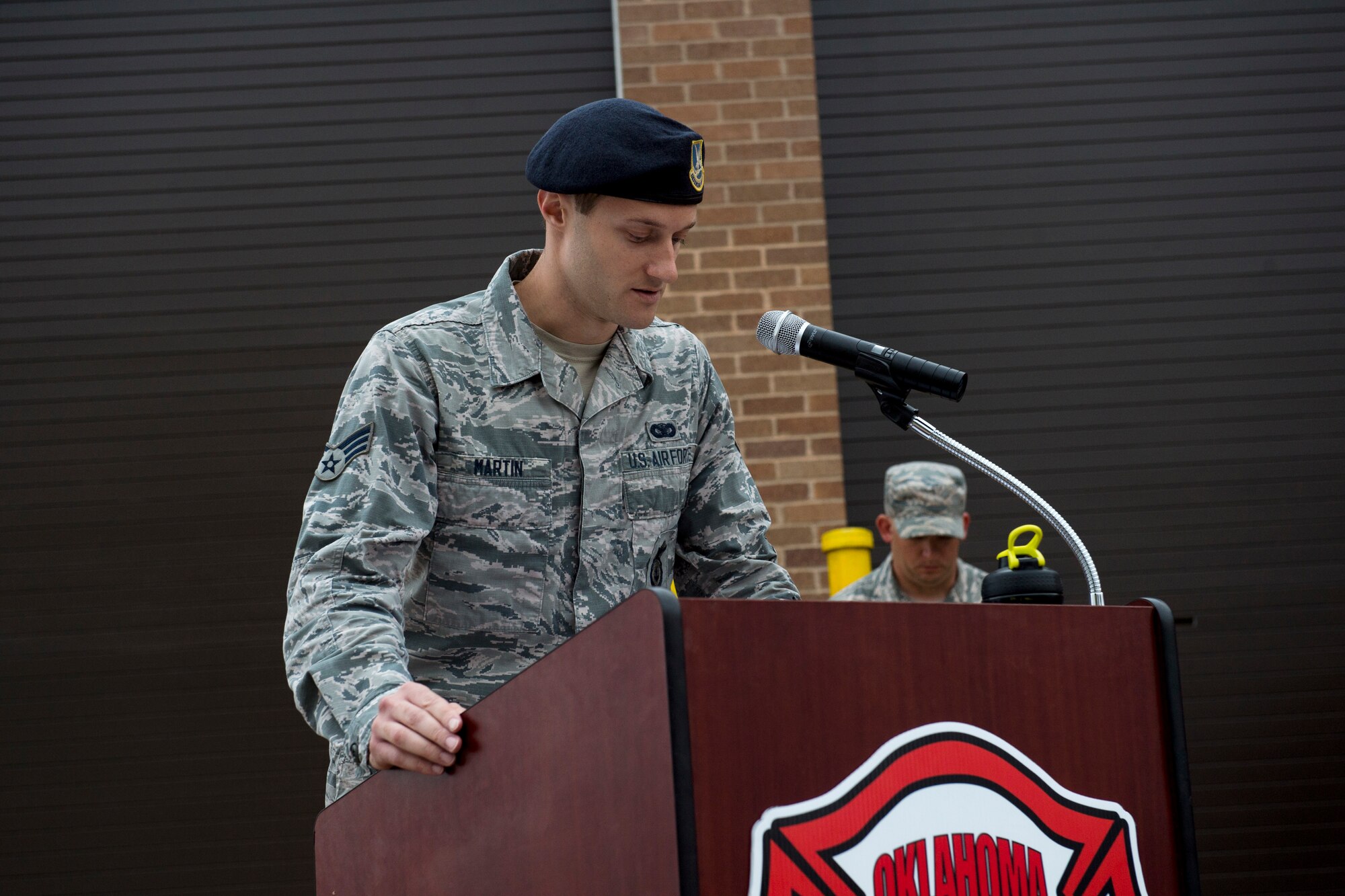 U.S. Air Force Senior Airman Jason Martin, a response force journeyman assigned to 97th Security Forces Squadron, reads the Policemen’s Prayer during the 9/11 Remembrance ceremony, Sept. 11, 2018, at Altus Air Force Base, Okla. The ceremony is an annual event to honor those who died in the line of duty during the tragic events of 9/11.