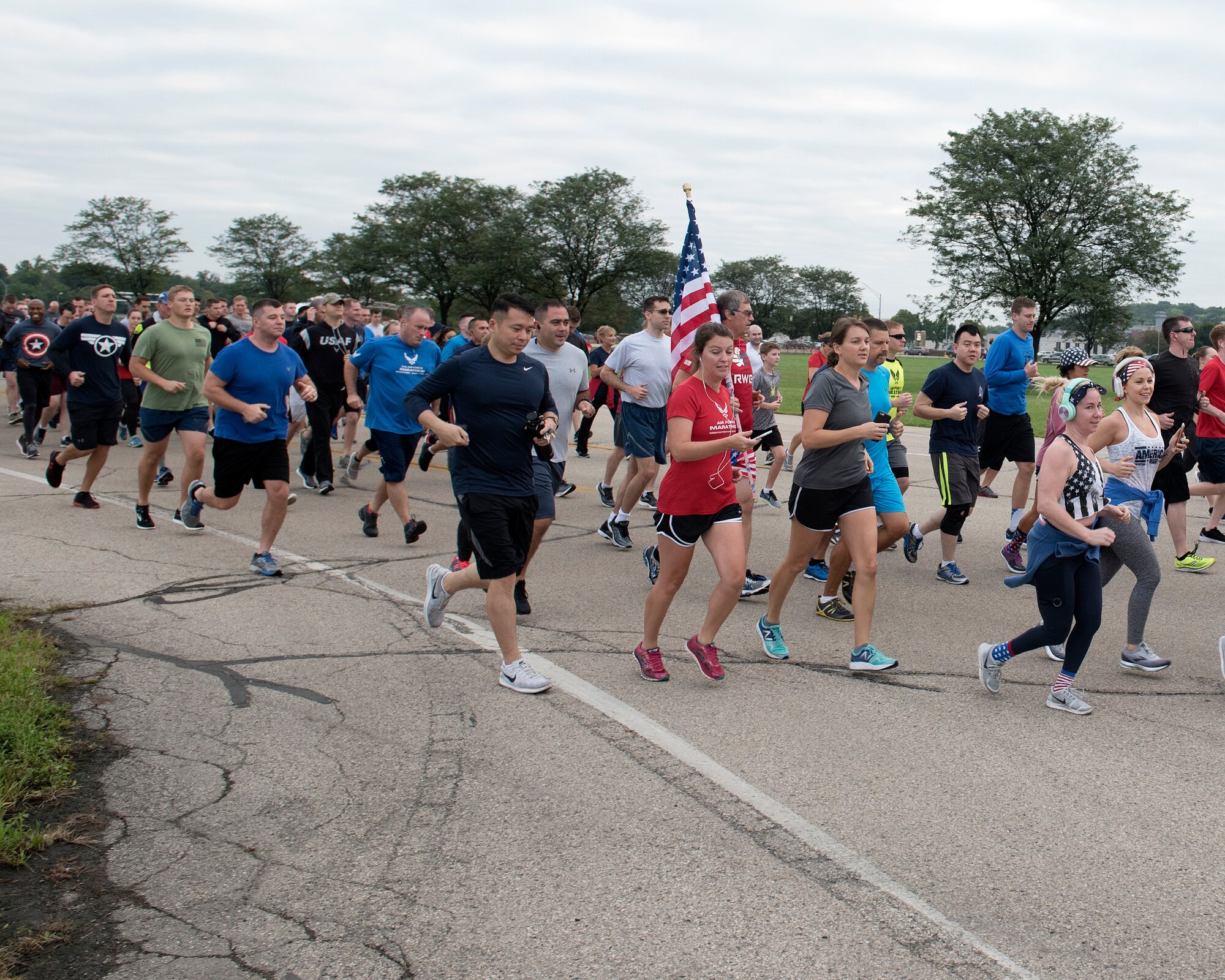 Participants run during the annual Run for the Fallen event at Wright-Patterson Air Force Base, Ohio, Sept. 11, 2018. The Run for the Fallen provides an opportunity to remember and honor those who lost their lives and recognize those who continue to defend the nation. (U.S. Air Force photo by Michelle Gigante)