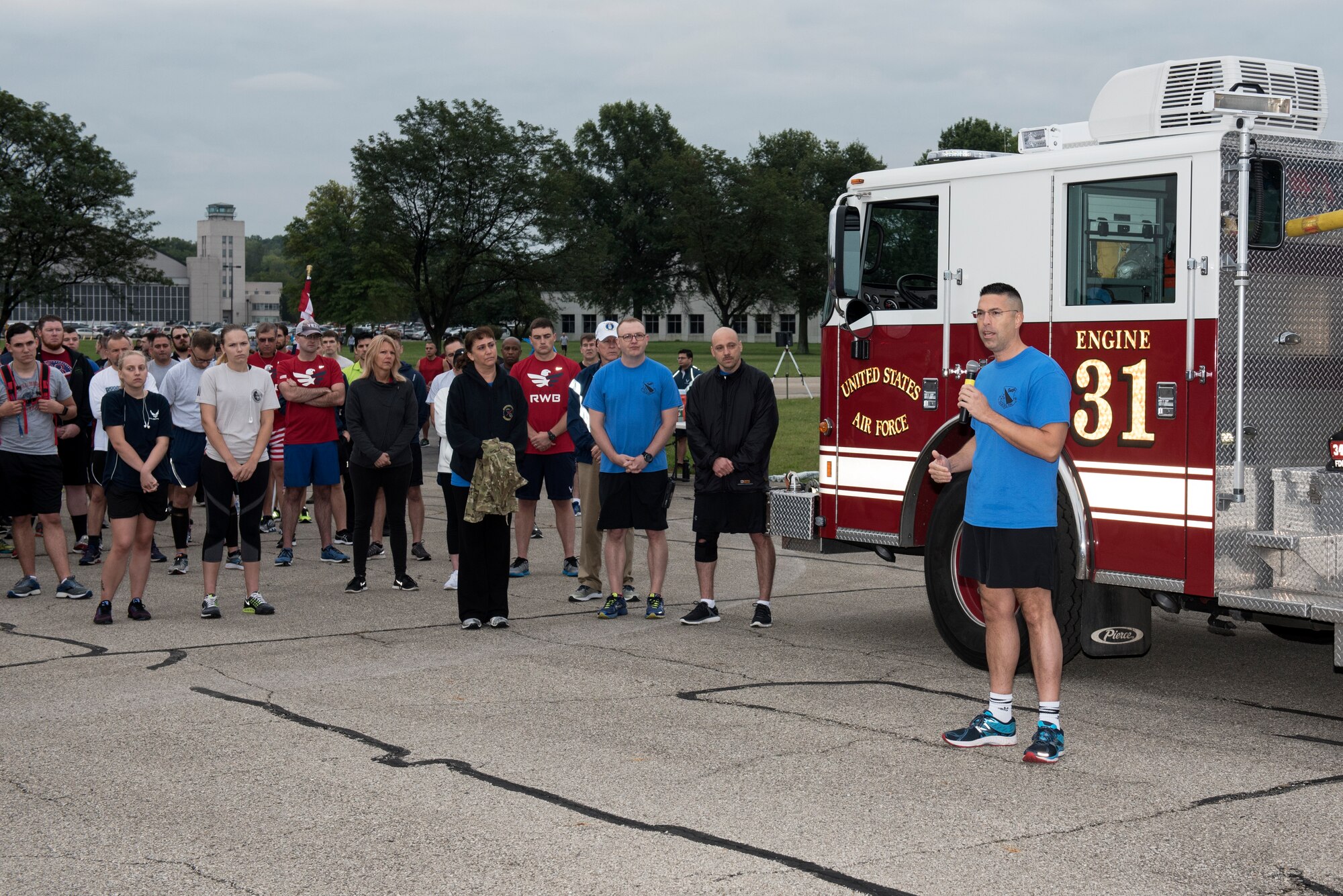 U.S. Air Force Col. Thomas P. Sherman, 88th Air Base Wing commander, makes welcoming comments prior to the start of the annual Run for the Fallen event at Wright-Patterson Air Force Base, Ohio, Sept. 11, 2018. Many members of the Wright-Patterson AFB community took part in the 5K run commemorating the 17th anniversary of the 9/11 terrorist attacks. (U.S. Air Force photo by Michelle Gigante)