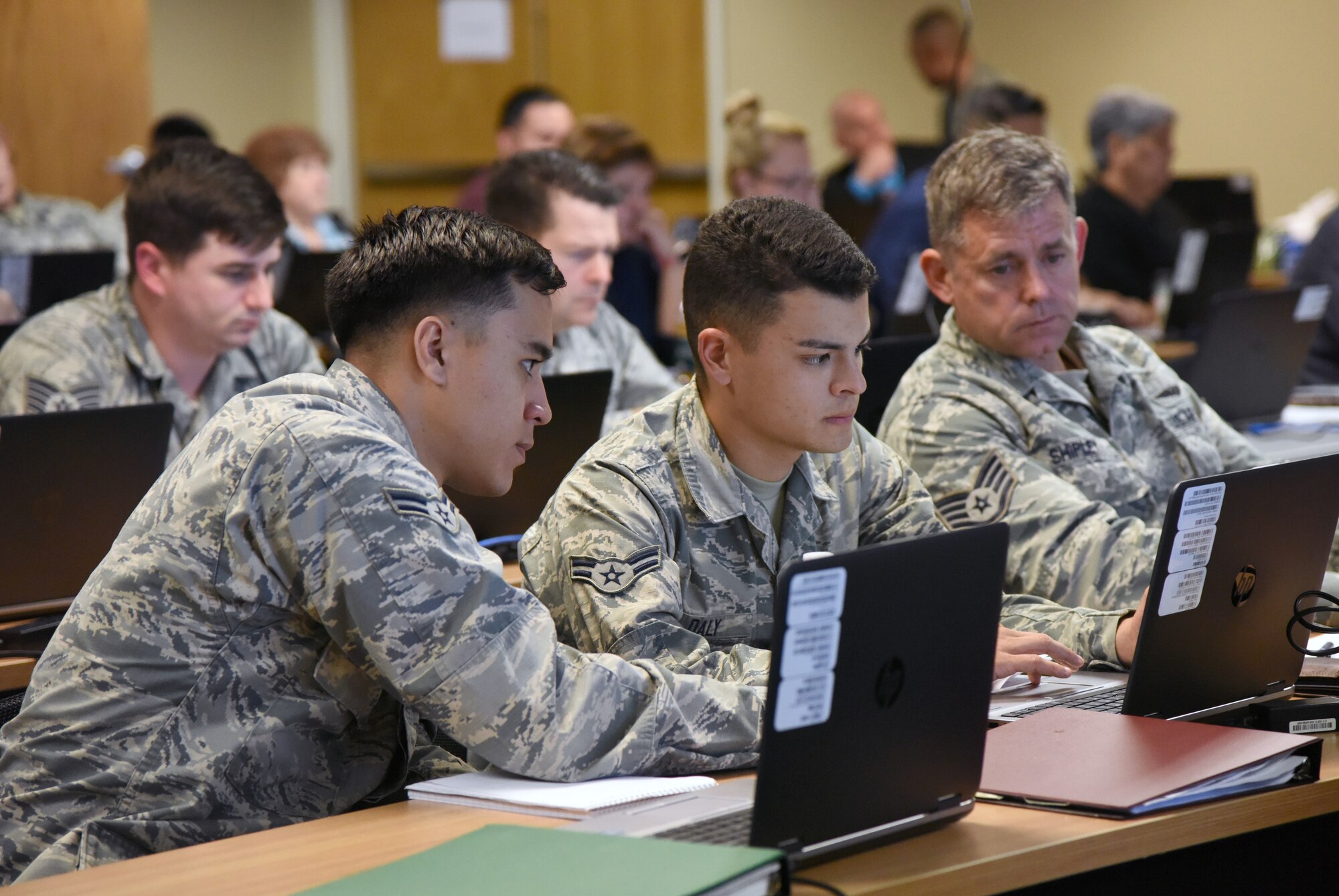 U.S. Air Force Airmen 1st Class Raymond Rowe and Jaran Daly, 460th Space Communications Squadron, Buckley Air Force Base, Colorado, and Staff Sgt. Derrick Shipley, 932nd Airlift Wing, Scott Air Force Base, Illinois, students, attend the 24th Air Force Enterprise Cyber Security Tools Training Course at Lott Hall at Keesler Air Force Base, Mississippi, Sept. 12, 2018. This is the first time the 690th Cyber Operations Group has held the course at Keesler. (U.S. Air Force photo by Kemberly Groue)