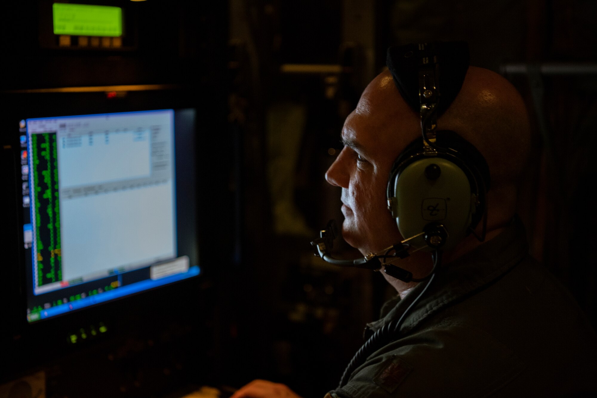 U.S Air Force Reserve Maj. Tobi Baker, 53rd Weather Reconnaissance Squadron aerial reconnaissance weather officer conducts weather research during a Hurricane Hunter mission after taking off from the Savanah Combat Readiness Training Center, Ga., Sept. 12, 2018. The U.S. Air Force Reserve's 53rd WRS is conducting a storm tasking mission into Hurricane Florence. The tasking provides critical and timely weather data for the National Hurricane Center to assist in providing up-to-date and accurate information for storm forecasts. (U.S. Air Force Photo by Tech. Sgt. Chris Hibben)