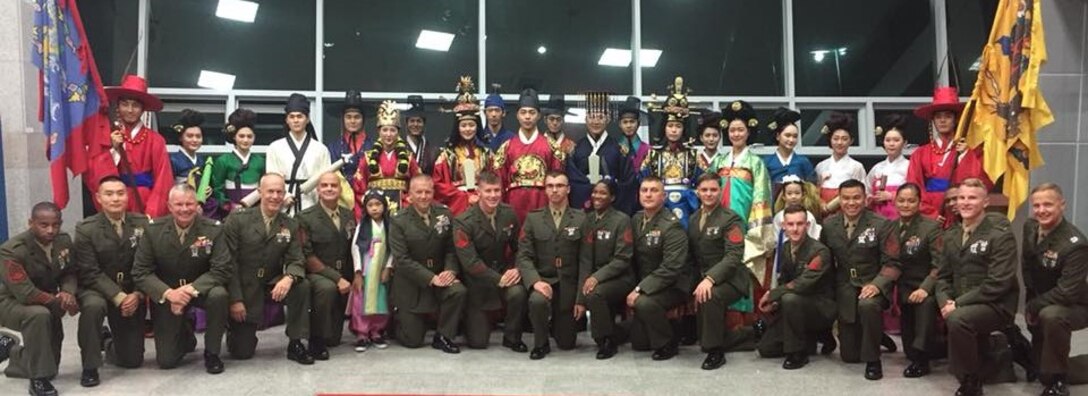 Camp Humphreys, Republic of Korea—U.S. Marine Forces Korea greets entertainers dressed in traditional Korean attire at the Ministry of Patriots and Veteran Affairs service member appreciation dinner in Songtan, Sept 12. The MPVA hosted the dinner to recognize the significance of United Nations Command and U.S. Forces Korea service members in defense of the Republic of Korea.