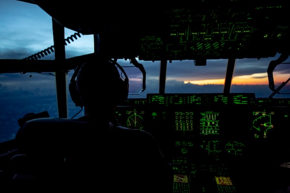 U.S. Air Force Reserve Lt. Col. Jerry Rutland, 53rd Weather Reconnaissance Squadron pilot, flies a WC-130J into the early morning sunrise as they approach Hurricane Florence Sept. 12, 2018. The U.S. Air Force Reserve Hurricane Hunters are conducting a reconnaissance mission to provide critical and timely weather data for the National Hurricane Center to assist in providing up-to-date and accurate information for storm forecasts. (U.S. Air Force photo by Tech. Sgt. Chris Hibben)