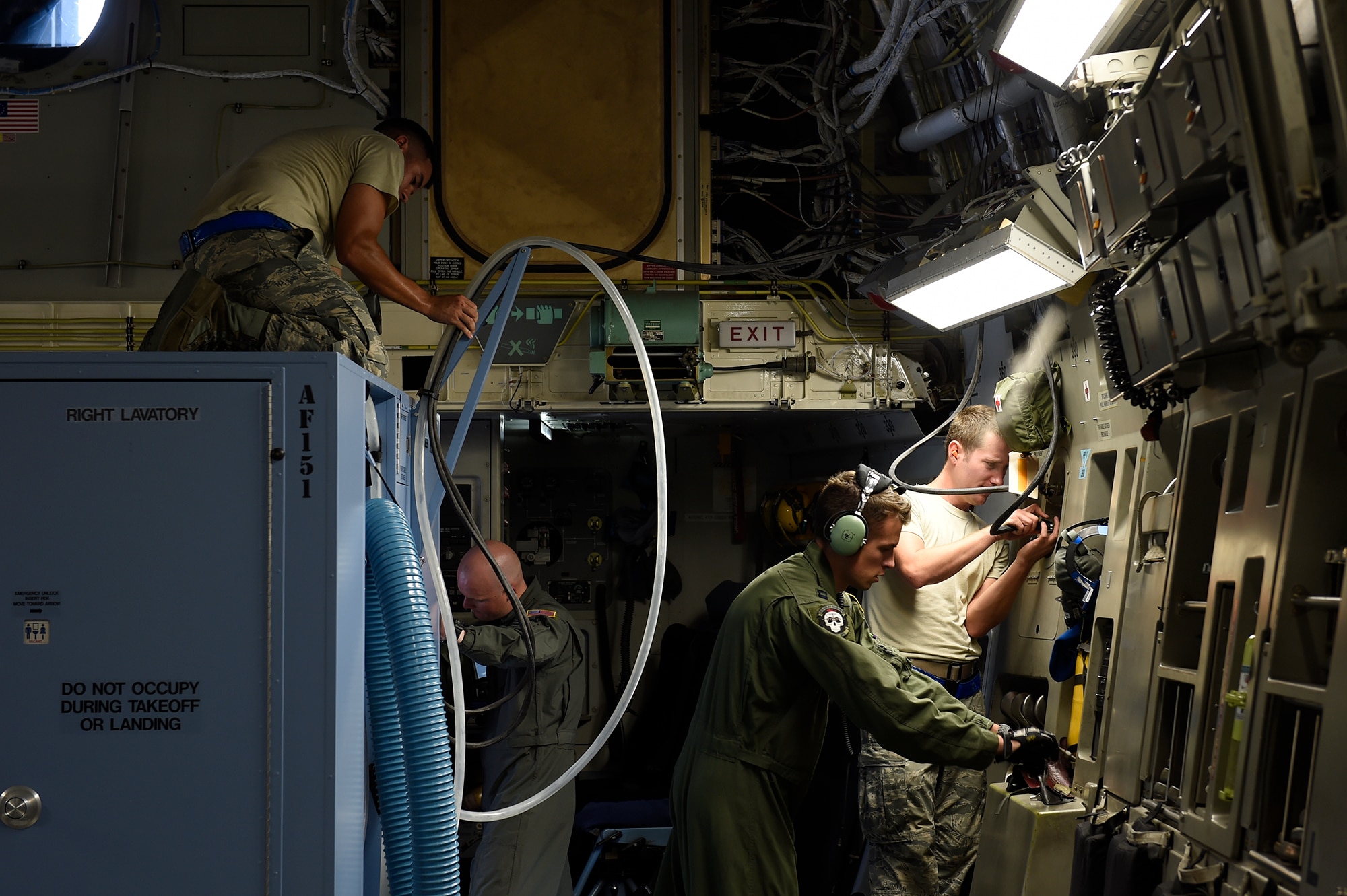 Airmen assigned to the 437th Aircraft Maintenance Squadron and 16th Airlift Squadron perform pre-flight operations on a C-17 Globemaster III at Joint Base Charleston, S.C., Sept. 11, 2018.