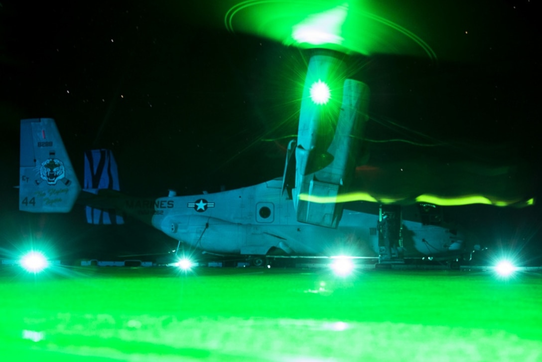 An MV-22B Osprey tiltrotor aircraft belonging to Marine Medium Tiltrotor Squadron 262 (Reinforced) idles atop the fight deck after landing aboard the amphibious assault ship USS Wasp (LHD 1), off the coast of Okinawa, Japan, Aug. 29, 2018.