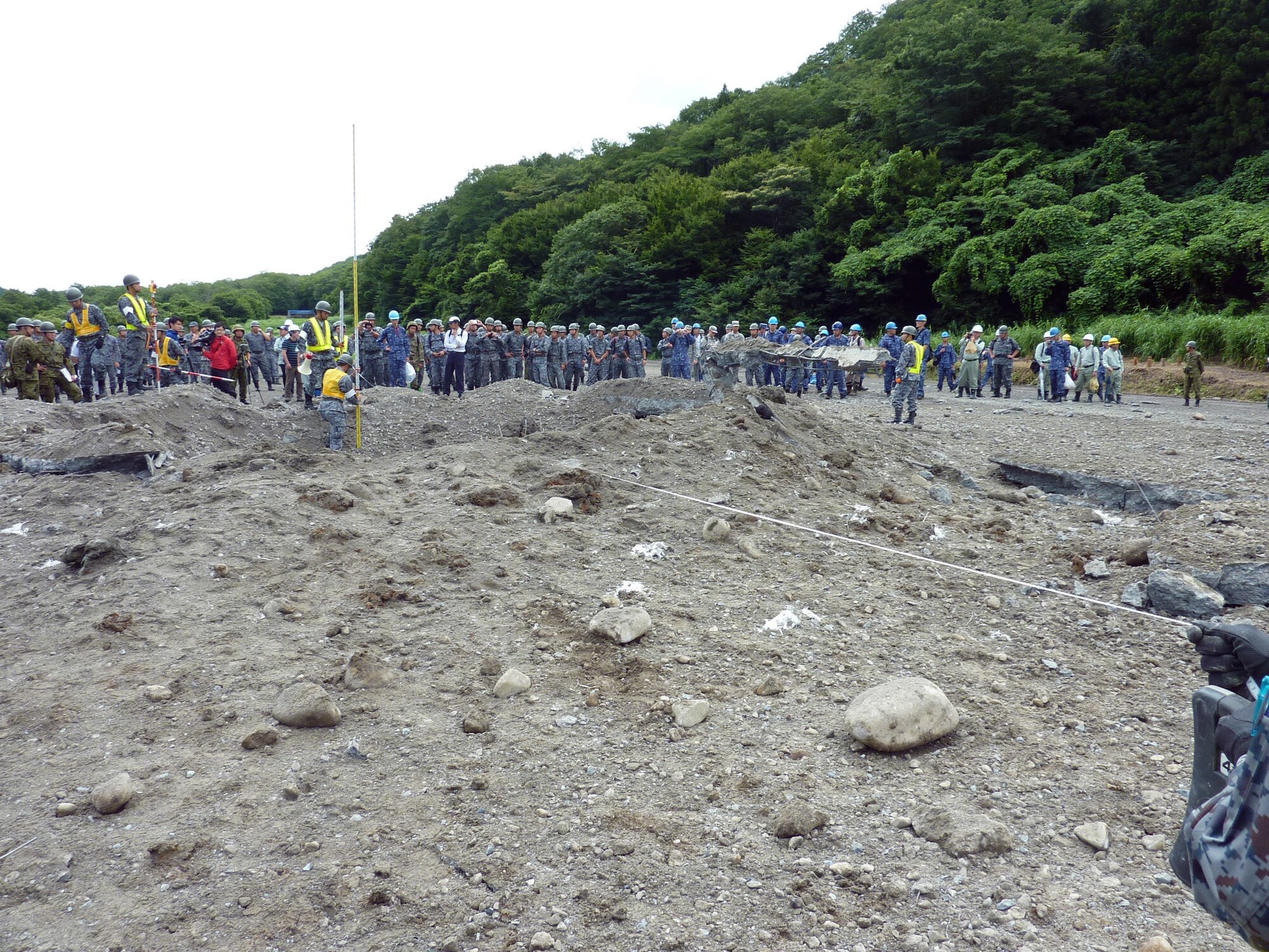 Koku Jieitai (Japan Air Self Defense Force) hosted U.S. Air Force members during their two-day live-fire, rapid airfield damage repair demonstration, August 8-9, 2018, Ohjoji-hara Exercise Range, Sendai, Japan.