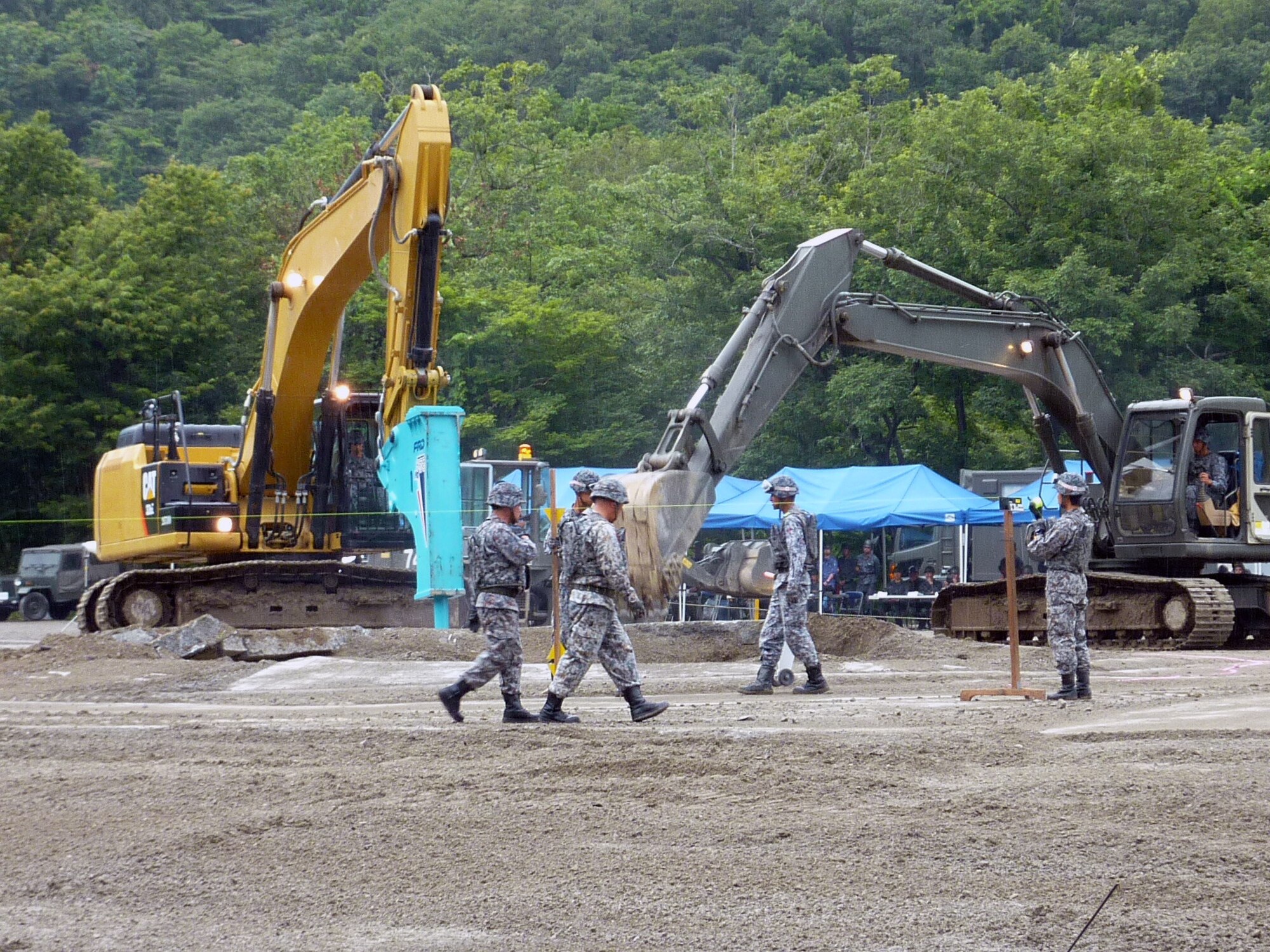 Koku Jieitai (Japan Air Self Defense Force) hosted U.S. Air Force members during their two-day live-fire, rapid airfield damage repair demonstration, August 8-9, 2018, Ohjoji-hara Exercise Range, Sendai, Japan.