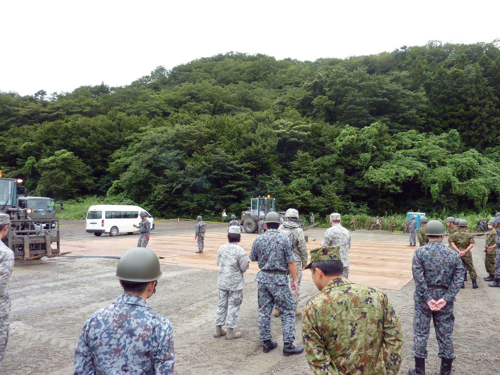 Koku Jieitai (Japan Air Self Defense Force) hosted U.S. Air Force members during their two-day live-fire, rapid airfield damage repair demonstration, August 8-9, 2018, Ohjoji-hara Exercise Range, Sendai, Japan.