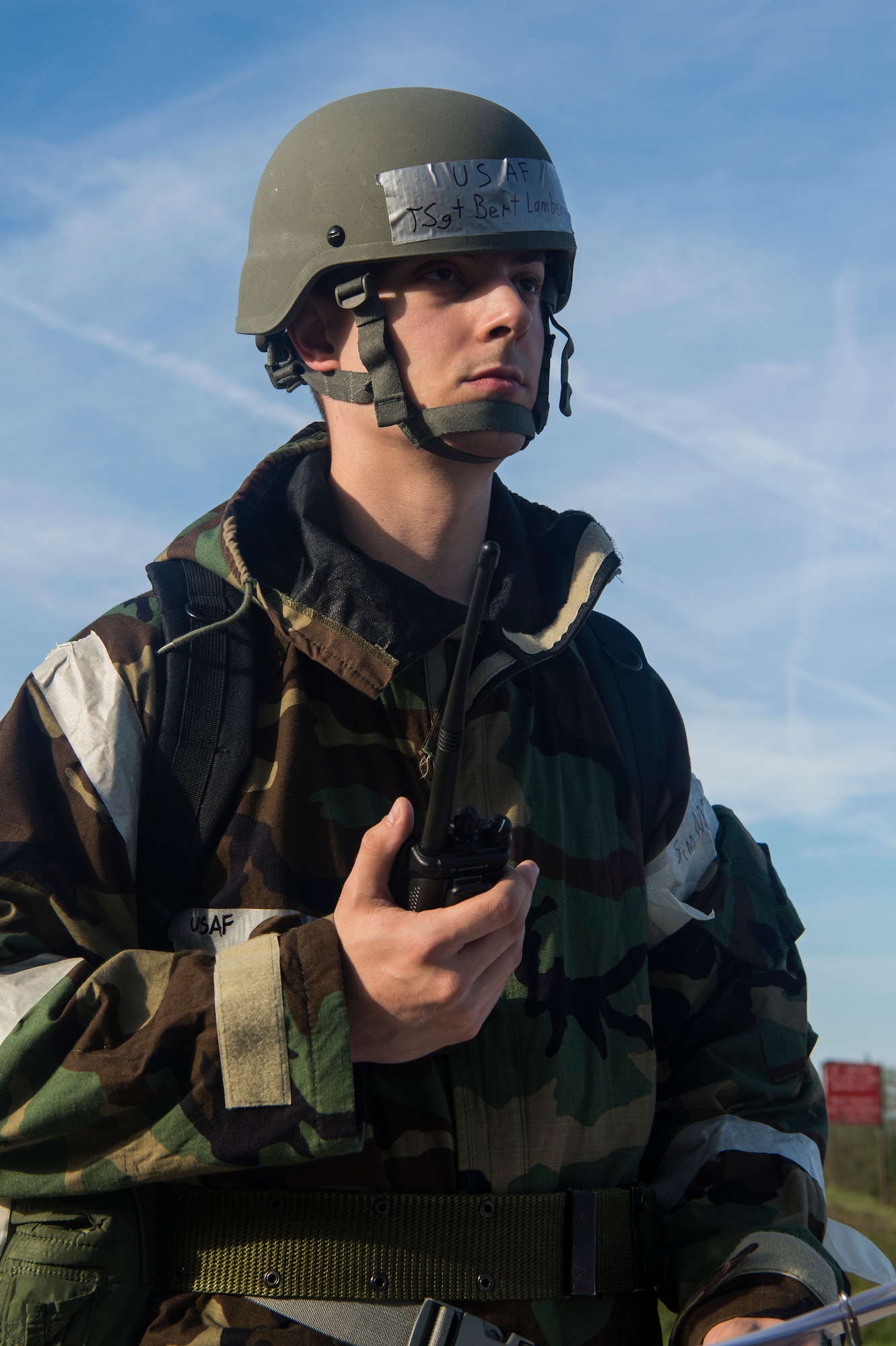 U.S. Air Force Tech. Sgt. Bert Lambert, 52nd Maintenance Support Squadron Fuel Support craftsman, conducts a battlefield damage assessment check during a readiness exercise at Spangdahlem Air Base, Germany, Sept. 11, 2018. Lambert relayed his findings to the Unit Control Center. The event required Airmen to identify and solve problems in less-than-ideal circumstances.  (U.S. Air Force photo by Airman 1st Class Valerie Seelye)