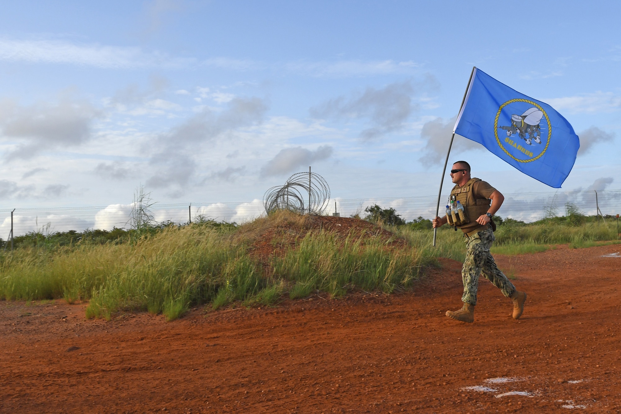 U.S. Air Force, Navy, and Army service members as well as Italian, French, German military members participated in a 9/11 Memorial 5K at Nigerien Air Base 101, Niamey, Niger, Sept. 11, 2018.