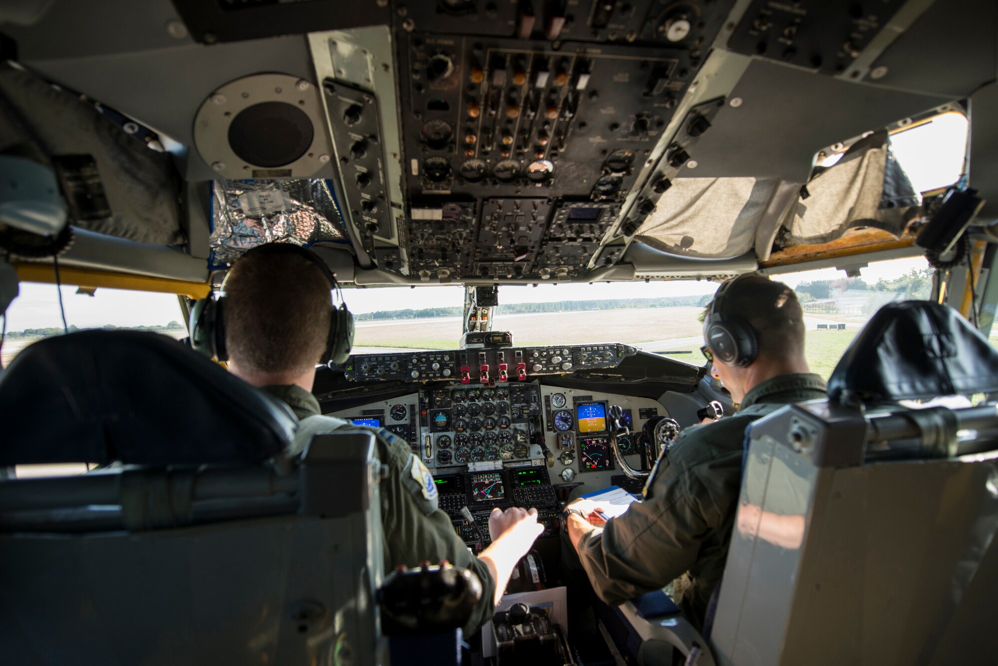 U.S. Air Force Capt. Jesse Prater, left, and Maj. Micah Yost, 351st Air Refueling Squadron pilots, taxi a KC-135 Stratotanker before take-off at RAF Mildenhall, England, Sept. 13, 2018. The 100th ARW supported training with a U.S. Air Force B-52 and Romanian Air Force F-16s in the airspace above Romania. (U.S. Air Force photo by Tech. Sgt. Emerson Nuñez)