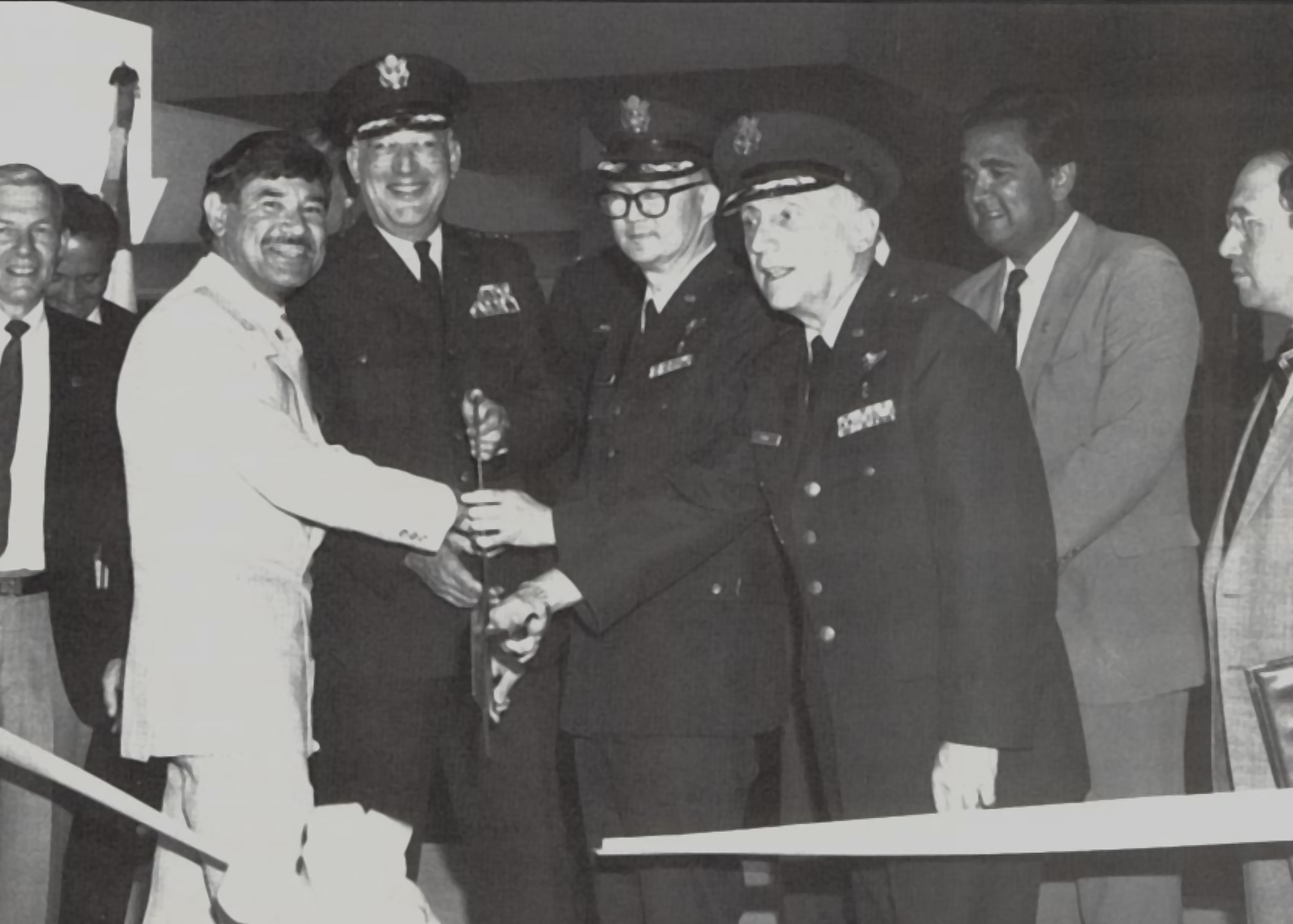 Pictured from left: Albuquerque Mayor Kenneth Schultz; Andrew Montano, recently retired director of the Department of Veterans Affairs Albuquerque Medical Center; Lt. Gen. Monte B. Miller, Air Force Surgeon General; Col. Warner J. W. Fan, Kirtland hospital commander; Brig. Gen. Frederick W. Plugge III, Military Airlift Command command surgeon, and U. S. Reps. Bill Richardson and Steve Schiff, cut the ribbon at a joint Air Force and VA “super clinic” at Kirtland Air Force Base, Sept. 8, 1989. (U.S. Air Force photo by Senior Airman Julie Zuffelato)