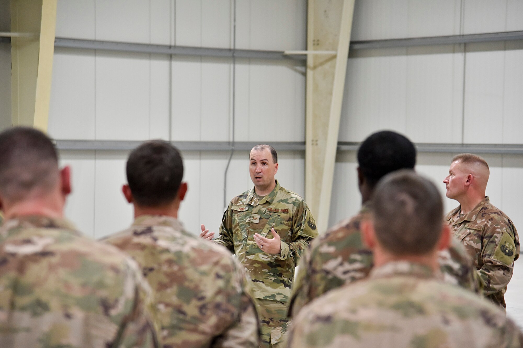 Staff Sgt. Christopher Ford, 379th Air Expeditionary Wing equal opportunity noncommissioned officer in charge, briefs the 1st Expeditionary Civil Engineering Group at Al Dhafra Air Base, United Arab Emirates, Sept. 11, 2018. The mission of EO includes enforcing a zero tolerance policy for unlawful discrimination as well as fostering positive human relations environments across squadrons, groups and wings.