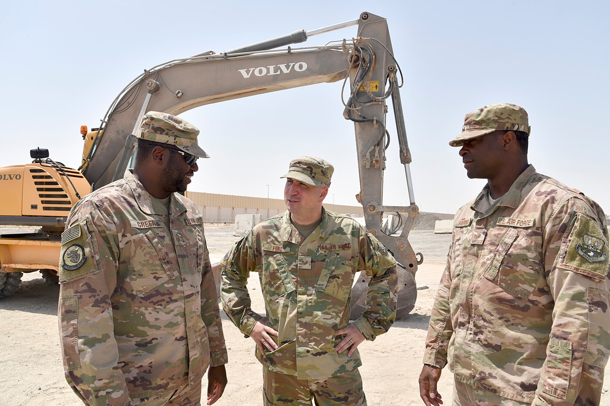 Staff Sgt. Christopher Ford, Equal Opportunity noncommissioned officer in charge, 379th Air Expeditionary Wing, speaks with members of the 1st Expeditionary Civil Engineering Group after conducting one-on-on interviews with the group at Al Dhafra Air Base, United Arab Emirates, Sept. 13, 2018. The mission of EO includes enforcing a zero tolerance policy for unlawful discrimination as well as fostering positive human relations environments across squadrons, groups and wings.