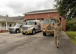Soldiers with the 1-118th Infantry Battalion stage a Light Medium Tactical Vehicle (LMTV) at the McClellanville Fire Department ahead of Hurricane Florence, Sept. 13, 2018, McClellanville, South Carolina.  Approximately 2,100 Soldiers and Airmen have been mobilized to prepare, respond and participate in recovery efforts for Hurricane Florence.
