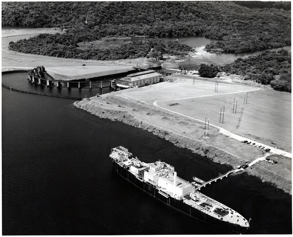 Undated image of STURGIS operating in the Panama Canal Zone. The STURGIS, a former World War II Liberty Ship, was converted into the first floating nuclear power plant in the 1960s. Before being shutdown in 1976, the STURGIS’ nuclear reactor, MH-1A, was used to generate electricity for military and civilian use in the Panama Canal.