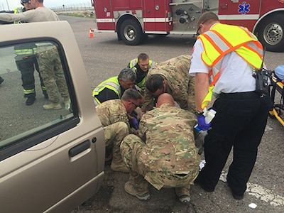 ​Seven members of the Colorado Air National Guard 140th Wing Explosives Ordnance Disposal Flight responded to a severe car accident May 9, 2017, outside of the Buckley Air Force Base perimeter in Aurora, Colo. The Airmen provided emergency care to an unconscious individual and directed traffic to facilitate access for Aurora Fire and Ambulatory services