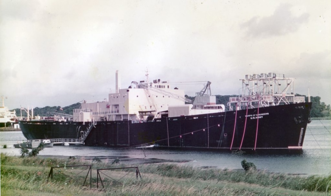 Undated image of STURGIS operating in the Panama Canal Zone. The STURGIS, a former World War II Liberty Ship, was converted into the first floating nuclear power plant in the 1960s. Before being shutdown in 1976, the STURGIS’ nuclear reactor, MH-1A, was used to generate electricity for military and civilian use in the Panama Canal.