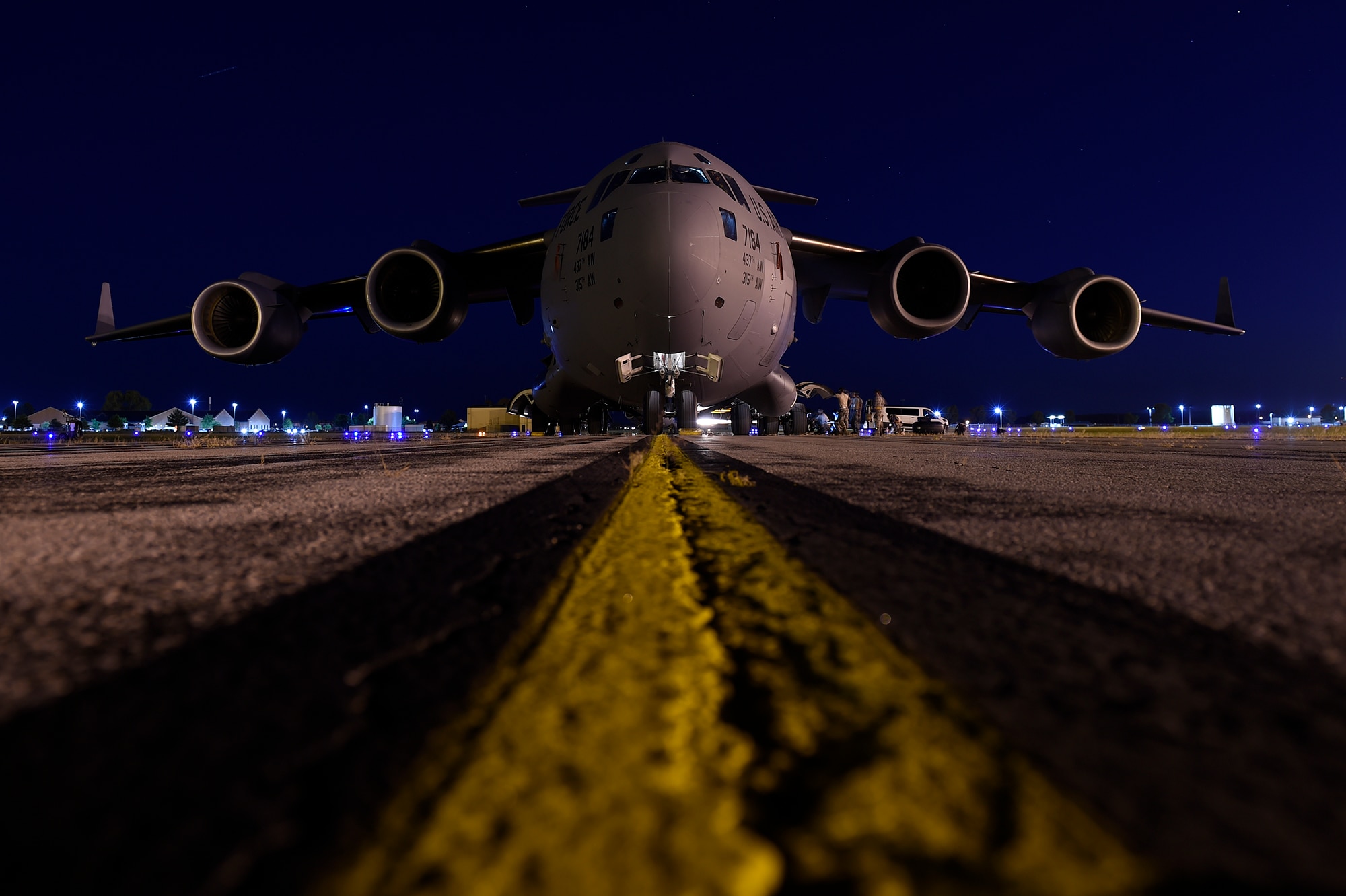 Airmen assigned to the 437th Aircraft Maintenance Squadron change a tire on a C-17 Globemaster III Sept. 13, 2018, at Scott Air Force Base, Ill. 437th AMXS maintainers serviced more than 10 aircraft that were evacuated from Joint Base Charleston, S.C., to Scott AFB ahead of Hurricane Florence. In all, more than 20 C-17s and supporting personnel were evacuated to three designated safe locations, enabling them to continue their global airlift operations.