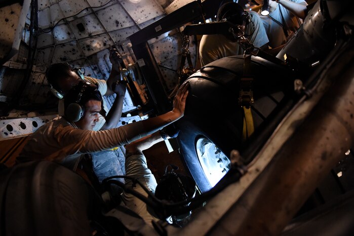 Airmen assigned to the 437th Aircraft Maintenance Squadron change a tire on a C-17 Globemaster III Sept. 13, 2018, at Scott Air Force Base, Ill. 437 AMXS maintainers serviced more than 10 aircraft that were evacuated from Joint Base Charleston, S.C., to Scott AFB ahead of Hurricane Florence. In all, more than 20 C-17s and supporting personnel were evacuated to designated safe locations, enabling them to continue their global airlift operations.