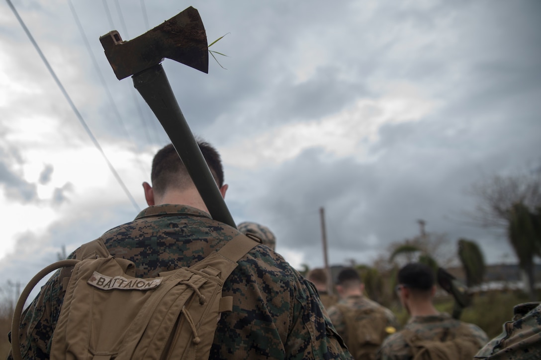 Marines and Sailors from Battalion Landing Team, 2nd Battalion, 5th Marines, and Combat Logistics Battalion 31, prepare to clean up debris after Typhoon Mangkhut during typhoon relief efforts in Rota, Commonwealth of the Northern Mariana Islands, Sept. 13, 2018. Service members from the Indo-Pacific Command are providing Department of Defense support to the Federal Emergency Management Agency, and working with Guam and Commonwealth of the Northern Mariana civil and local officials for Typhoon Mangkhut recovery efforts. The 31st Marine Expeditionary Unit, the Marine Corps’ only continuously forward-deployed MEU, provides a flexible force ready to perform a wide-range of military operations.