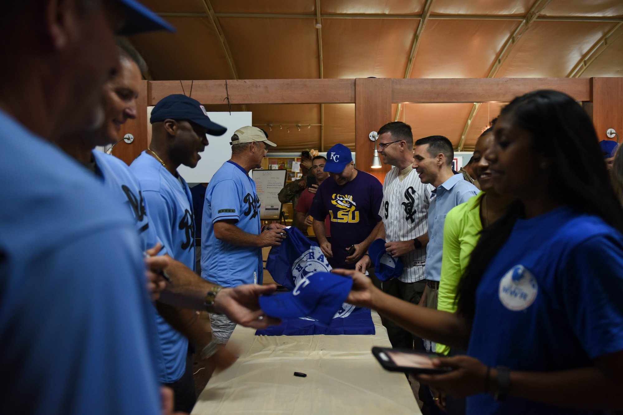 Members from the 386th Air Expeditionary Wing, meet with Kansas City Royals baseball legends during the USO tour “This one’s for you” Sept. 12, 2018, at Camp Buehring, Kuwait. During the tour, Airmen and Soldiers were able to visit with the former Major League Baseball all-stars and watch a live-stream Royals game from Kansas City. (U.S. Air Force photo by Tech. Sgt. Caleb Pierce)