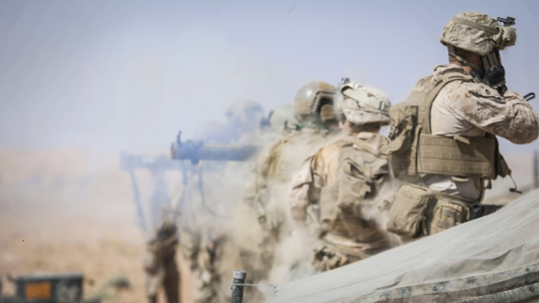 SOUTHWEST ASIA – U.S. Marines with 3rd Battalion, 7th Marine Regiment, attached to Special Purpose Marine Air-Ground Task Force, Crisis Response-Central Command, fire an Mk 153 shoulder-launch multipurpose assault weapon, at a target during a live-fire demonstration near At-Tanf Garrison, Syria, Sept. 7, 2018. SPMAGTF-CR-CC Marines supported Special Operations Joint Task Force – Operation Inherent Resolve, conducting live-fire demonstrations showcasing the unit’s crisis response capabilities.  (U.S. Marine Corps photo by Cpl. Carlos Lopez)