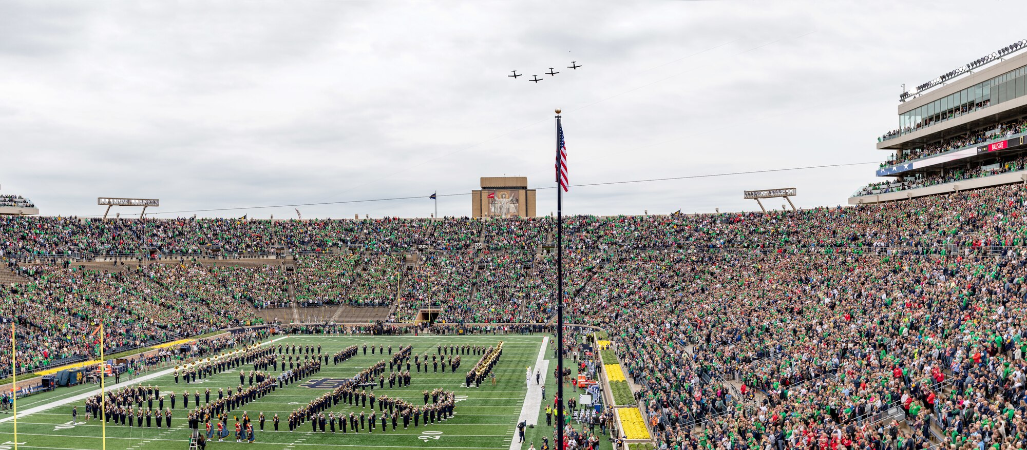 Four T-6 Texan IIs assigned to the 37th Flying Training Squadron fly over Notre Dame Stadium before the game against Ball State Sept. 8, 2018, in South Bend, Indiana. The 37th FTS accomplished 188 sorties from Sept. 6-10, and also increased knowledge and proficiency for all instructor pilots in an off-station training environment in addition to performing a flyover. (Photo by Matt Cashore/University of Notre Dame)