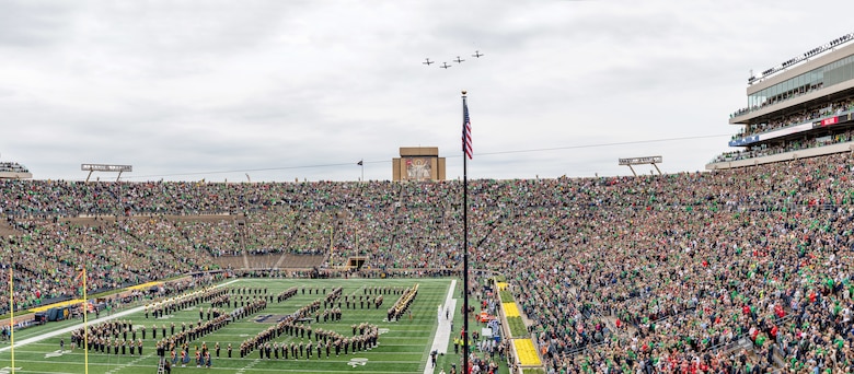 Four T-6 Texan IIs assigned to the 37th Flying Training Squadron fly over Notre Dame Stadium before the game against Ball State Sept. 8, 2018, in South Bend, Indiana. The 37th FTS accomplished 188 sorties from Sept. 6-10, and also increased knowledge and proficiency for all instructor pilots in an off-station training environment in addition to performing a flyover. (Photo by Matt Cashore/University of Notre Dame)