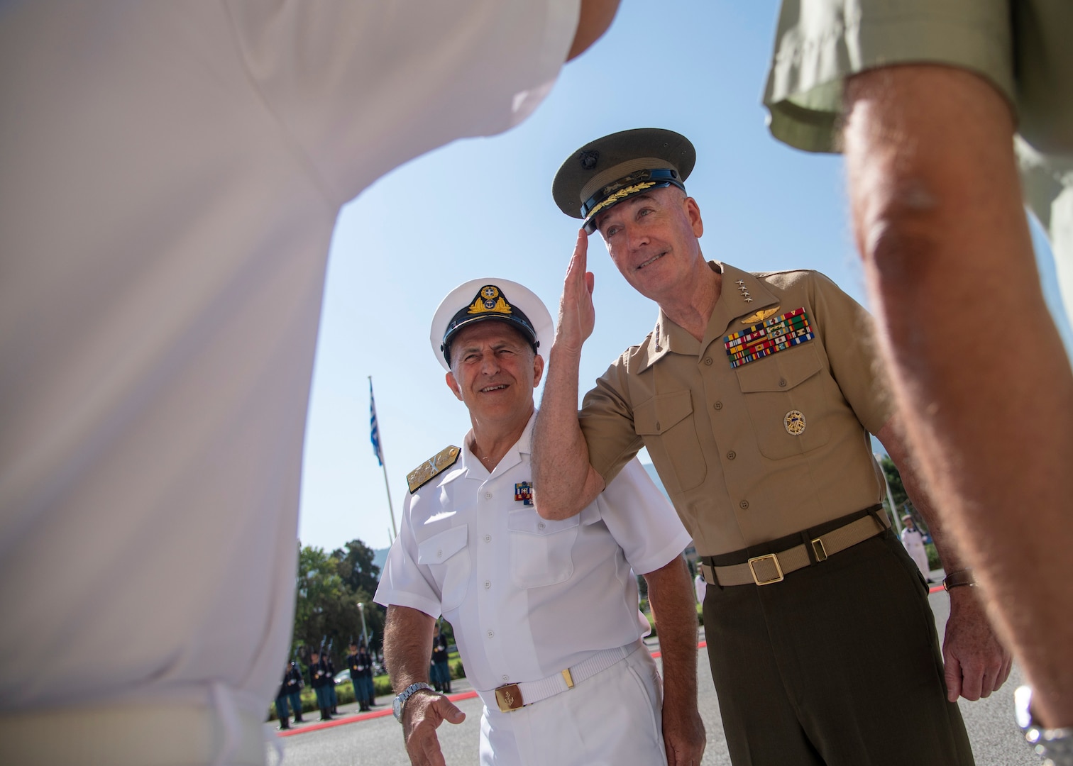 Marine Corps Gen. Joe Dunford, chairman of the Joint Chiefs of Staff, greets the staff of Greek Navy Adm. Evangelos Apostolakis, chief of the Hellenic National Defense General Staff, at the Ministry of Defense in Athens, Greece.