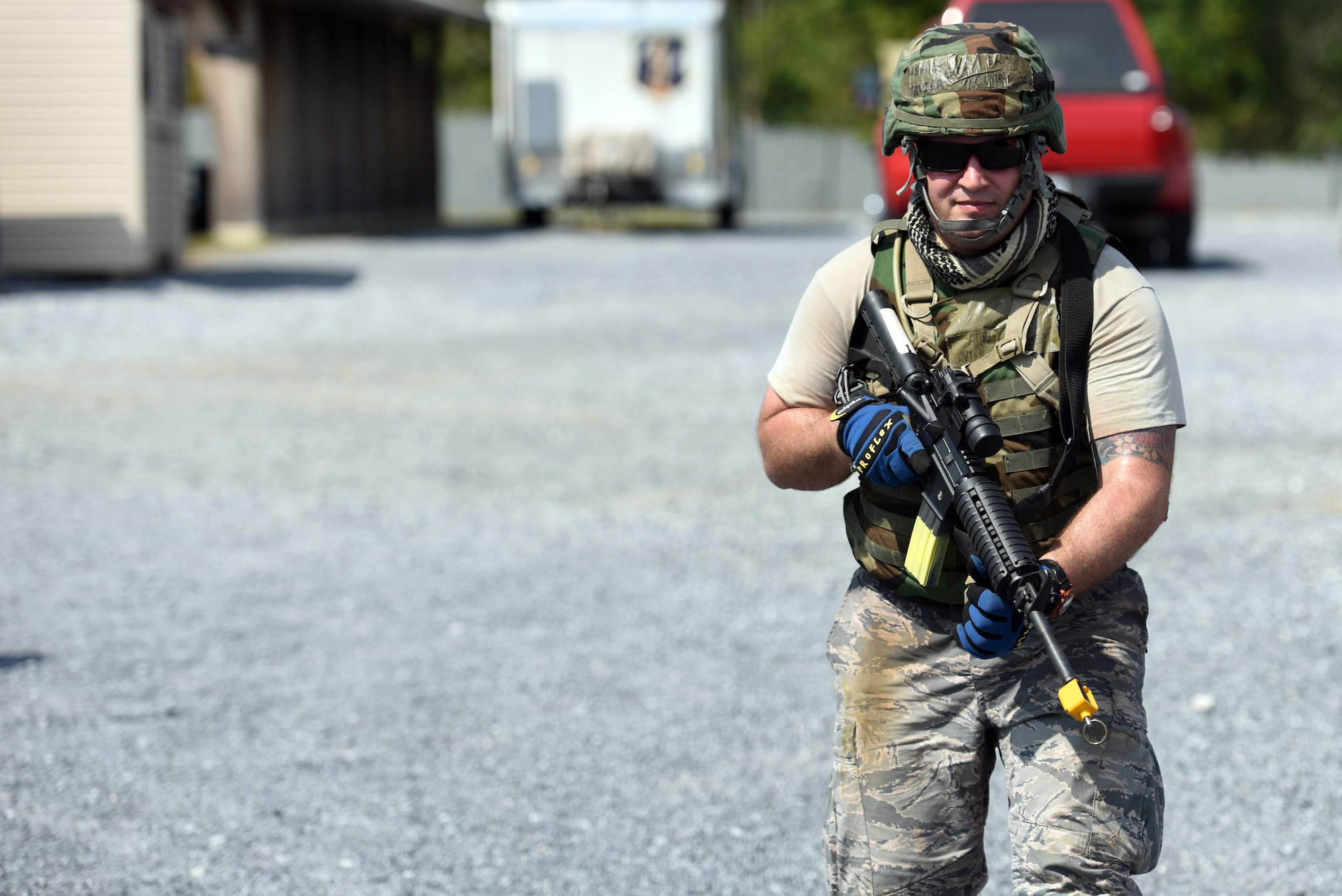 Tech. Sgt. Javier Acosta-Gomez, an electrical systems technician with the 201st RED HORSE Squadron, Fort Indiantown Gap, Pennsylvania, participates in a field training exercise Sept. 6, 2018. Acosta-Gomez was participating in the individual and team movements segment, which included movements such as high crawl, low crawl and ‘slicing the pie.’ (U.S. Air National Guard photo by Senior Airman Julia Sorber/Released)