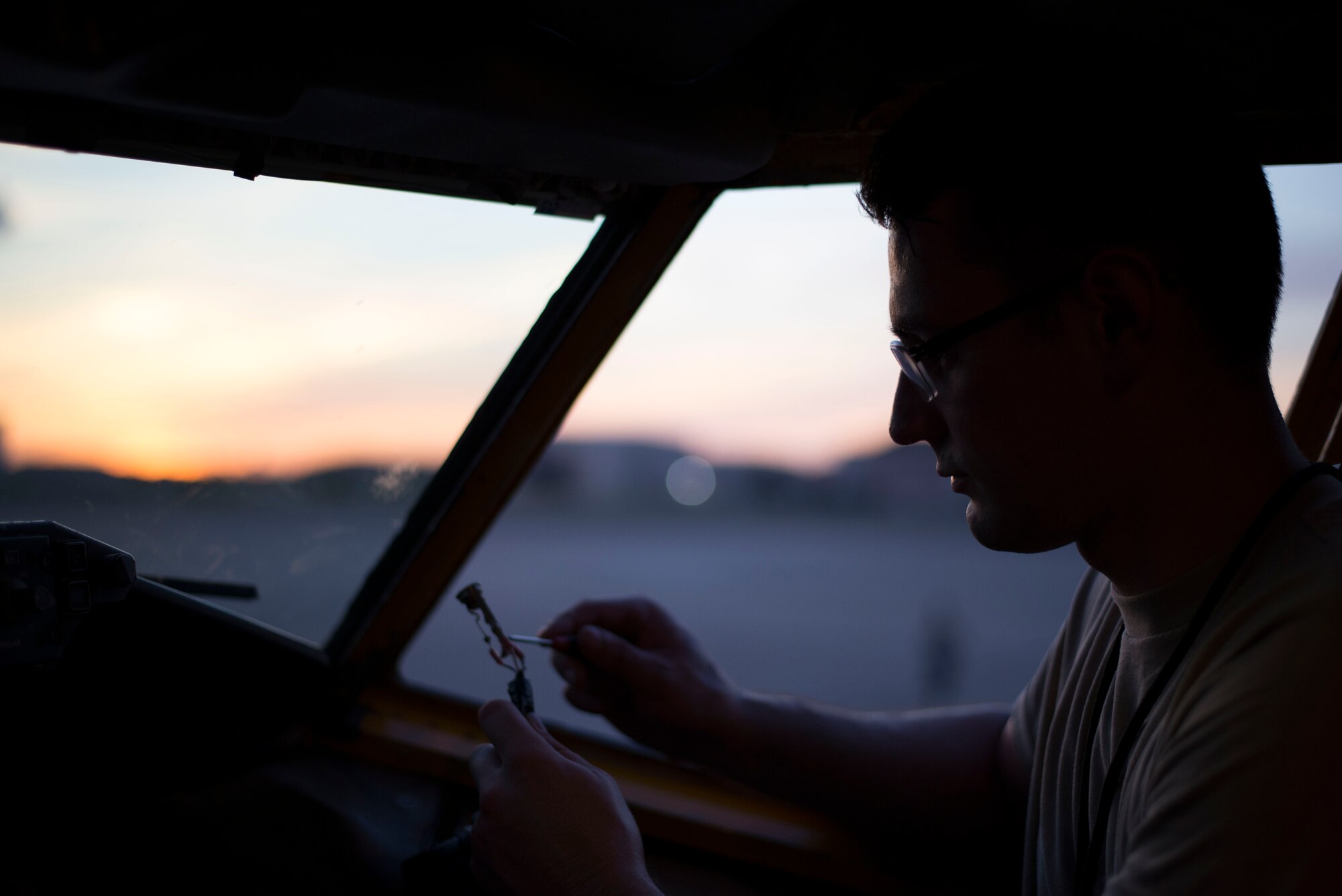 U.S. Air Force Airman 1st Class Mason Schumm, an aircraft electrical and environmental apprentice assigned to the 6th Aircraft Maintenance Squadron, performs a KC-135 Stratotanker aircraft pre-flight inspection during an operational readiness exercise at MacDill Air Force Base, Florida, Sept. 11, 2018.