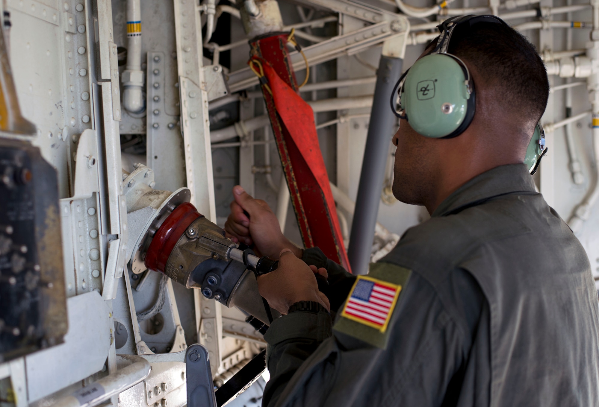 An Airman assigned to the 6th Logistics Readiness Squadron’s petroleum, oil, and lubricants flight fuels a KC-135 Stratotanker aircraft at MacDill Air Force Base, Florida, Sept. 12, 2018.