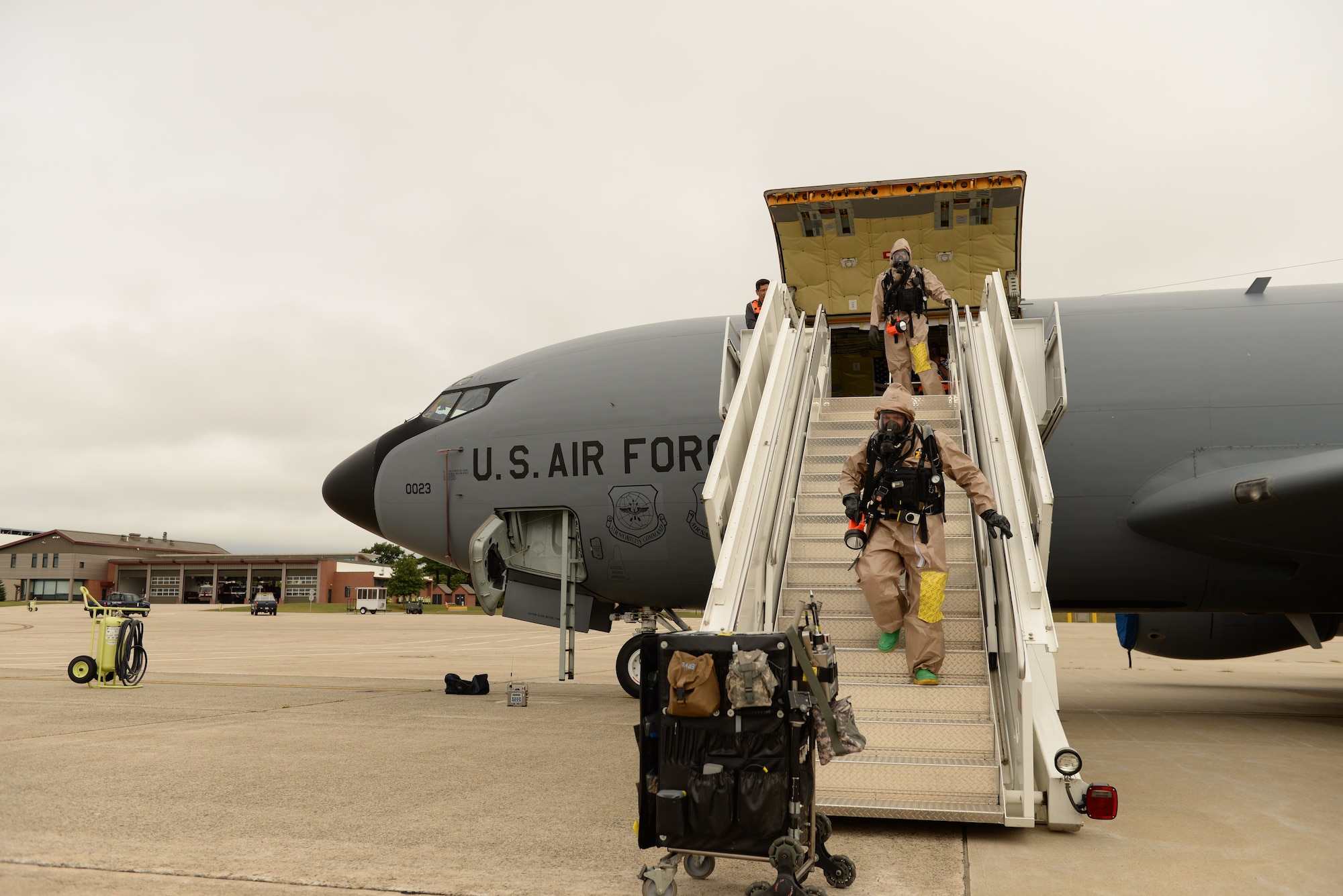 Sgt. David Fostier, and Sgt. Taylor Hallett, of the New Hampshire National Guard 12th Civil Support Team leave a KC-135 Stratotanker after conducting a site survey on board checking for hazardous substances as part of an external evaluation of the 12th CST’s overall mission readiness, N.H., Sept. 11, 2018, at Pease Air National Guard Base. The 12th Civil Support Team includes 22 N.H. National Guard airmen and soldiers who are ready to mobilize within one hour. The team is designed to detect weapons of mass destruction, specializing in the detection of chemical, nuclear, biological and explosive agents. (Photo by Master Sgt. Thomas Johnson, 157th ARW Public Affairs)