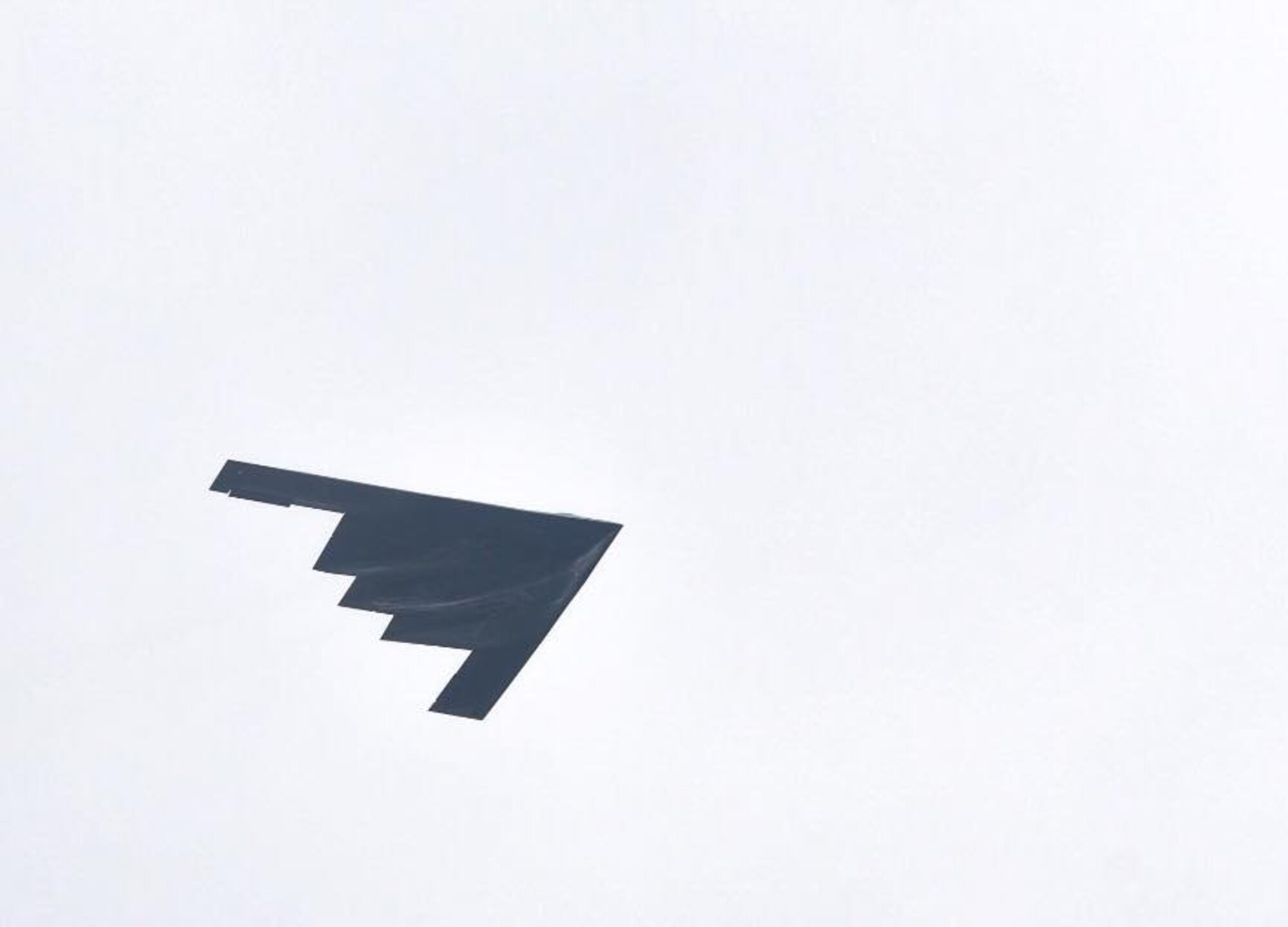 A B-2 Spirit from Whiteman Air Force Base, Missouri, performs a flyover at the Frontiers in Flight Open House and Air Show Sept. 8, 2018, at McConnell AFB, Kansas. The B-2 is a multi-role bomber, capable of delivering both conventional and nuclear munitions. (U.S. Air Force photo by Airman 1st Class Michaela R. Slanchik)