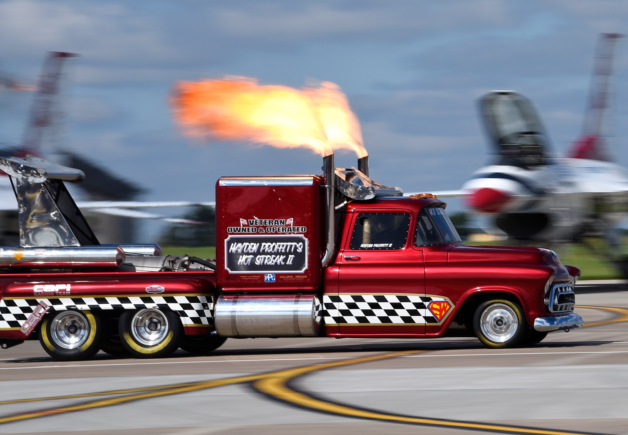 The Smoke N Thunder Hot Steak II JetTruck performs at the Frontiers in Flight Open House and Air Show Sept. 9, 2018, at McConnell Air Force Base, Kansas. The twin-jet-engine truck is capable of speeds higher than 350 mph and entertains at air shows and drag races across the country. (U.S. Air Force photo by Airman 1st Class Michaela R. Slanchik)