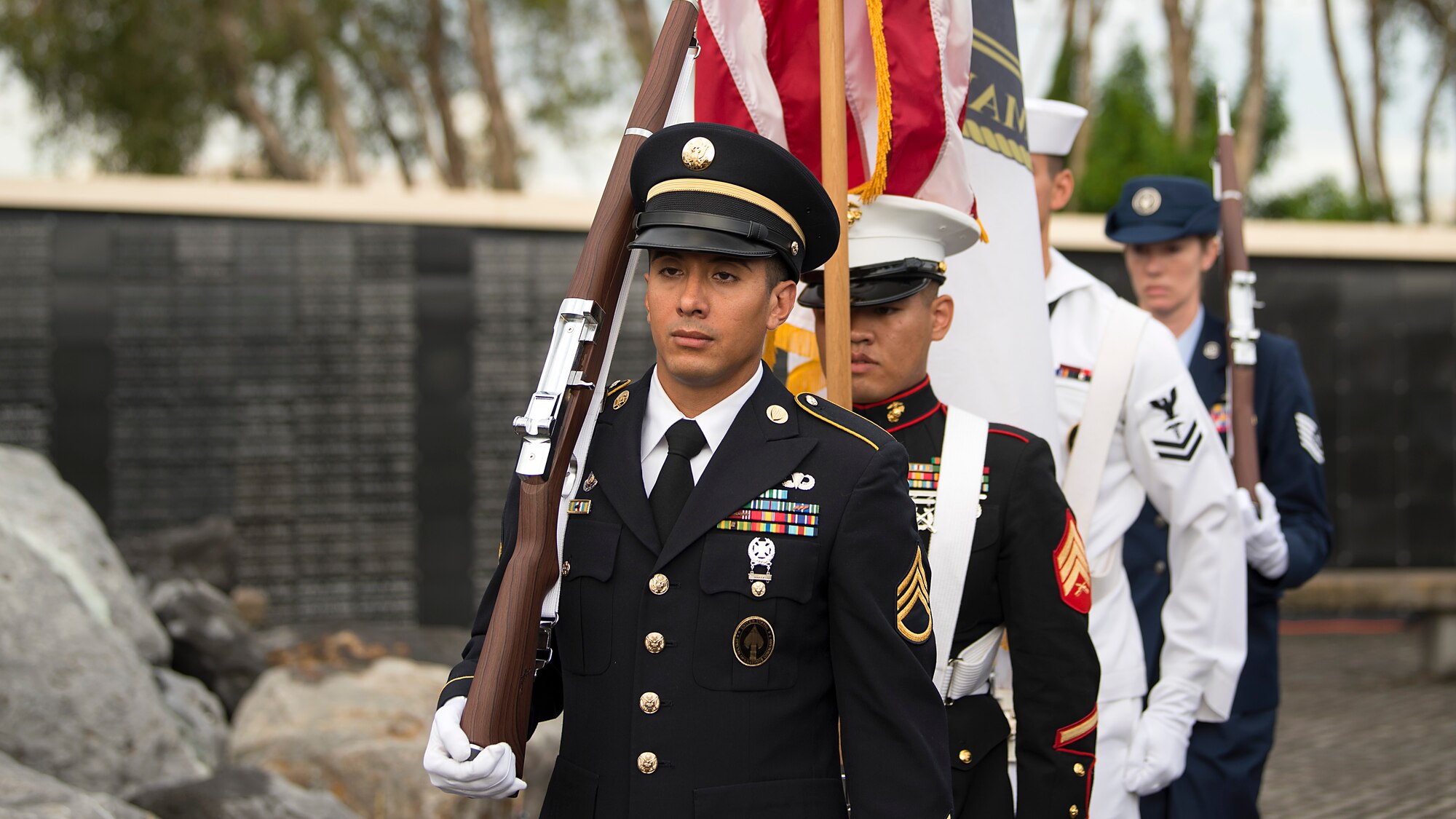 Service members from MacDill Air Force Base, Fla., exit after presenting the colors during a 9/11 memorial ceremony Sept. 11, 2018. The remembrance ceremony was held at the U.S. Special Operations Command Memorial in honor of those who died during the attacks.