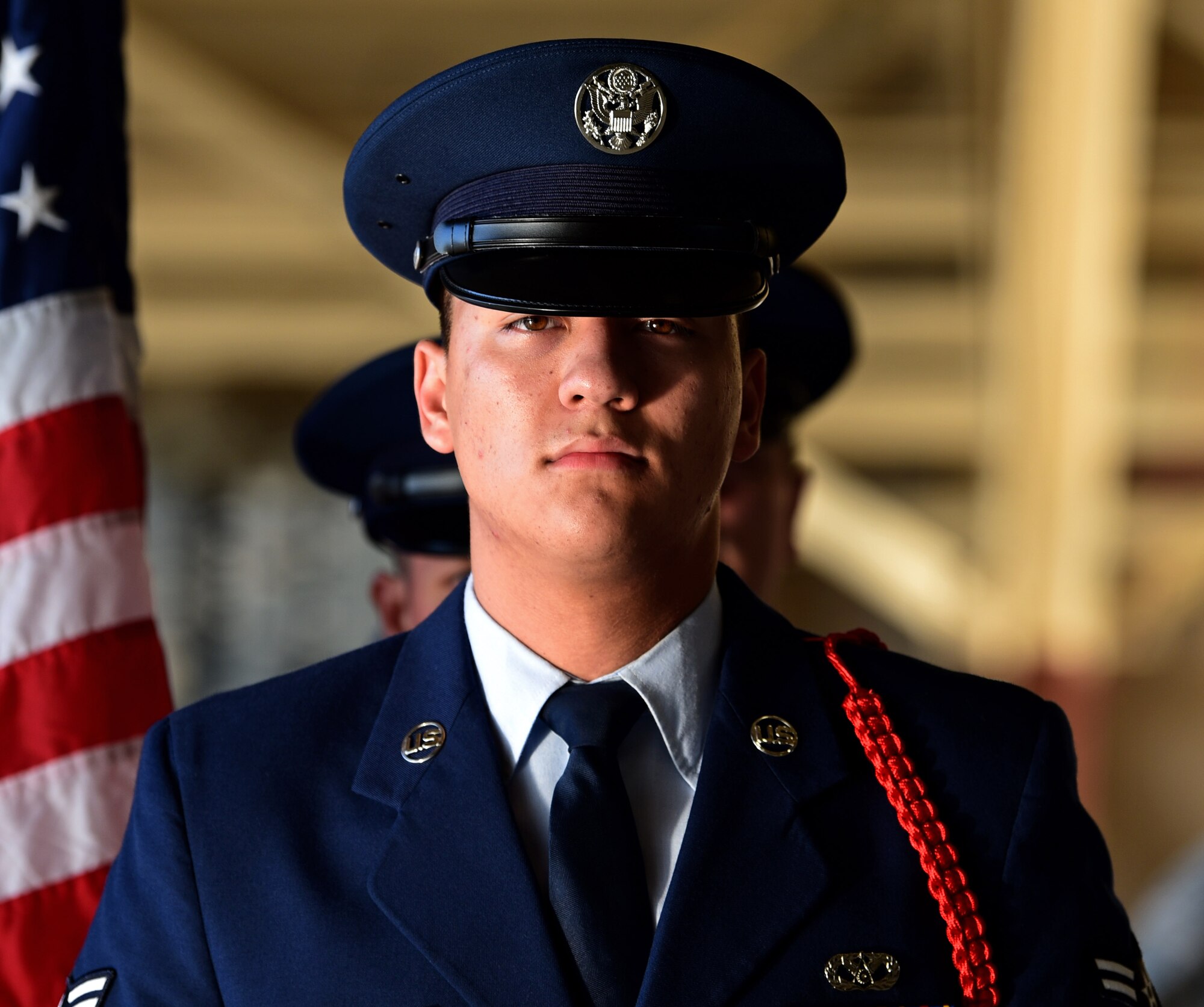U.S. Air Force Airman 1st Class Taylor Stone, 325th Civil Engineer Squadron firefighter, waits to present the U.S. Flag during a 9/11 remembrance ceremony at Tyndall Air Force Base, Fla., Sept. 11, 2018. Every year Americans gather to remember and honor the nearly 3,000 people killed in the World Trade Center, Pennsylvania, and Pentagon terrorist attacks. (U.S. Air Force photo by Senior Airman Isaiah J. Soliz)