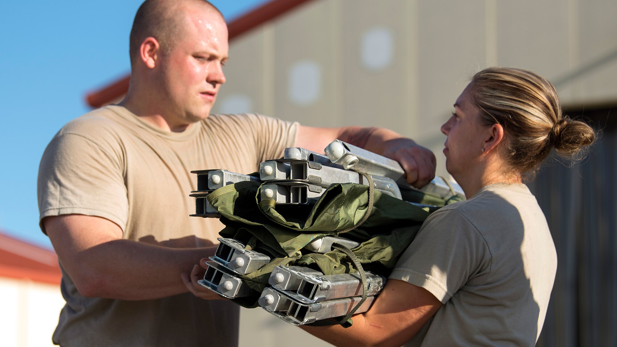 Members from the En-Route Patient Staging System team from MacDill Air Force Base, Fla., fold litters in preparation of Hurricane Florence Sept. 13, 2018. The ERPSS team’s mission is to provide clinical support to patients in response to a natural disaster.