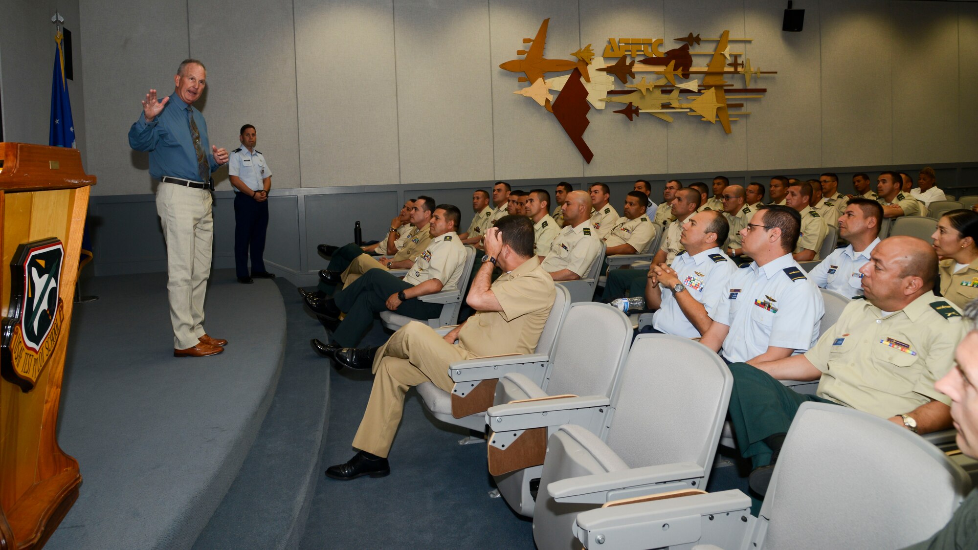Members of the Colombian and Brazilian air forces check out an X-43 during their visit to the museum at Edwards Air Force Base, California, Sept. 10, 2018. During their visit, the delegation received briefs on the overall mission of Edwards and toured various base facilities. (U.S. Air Force photo by Giancarlo Casem)