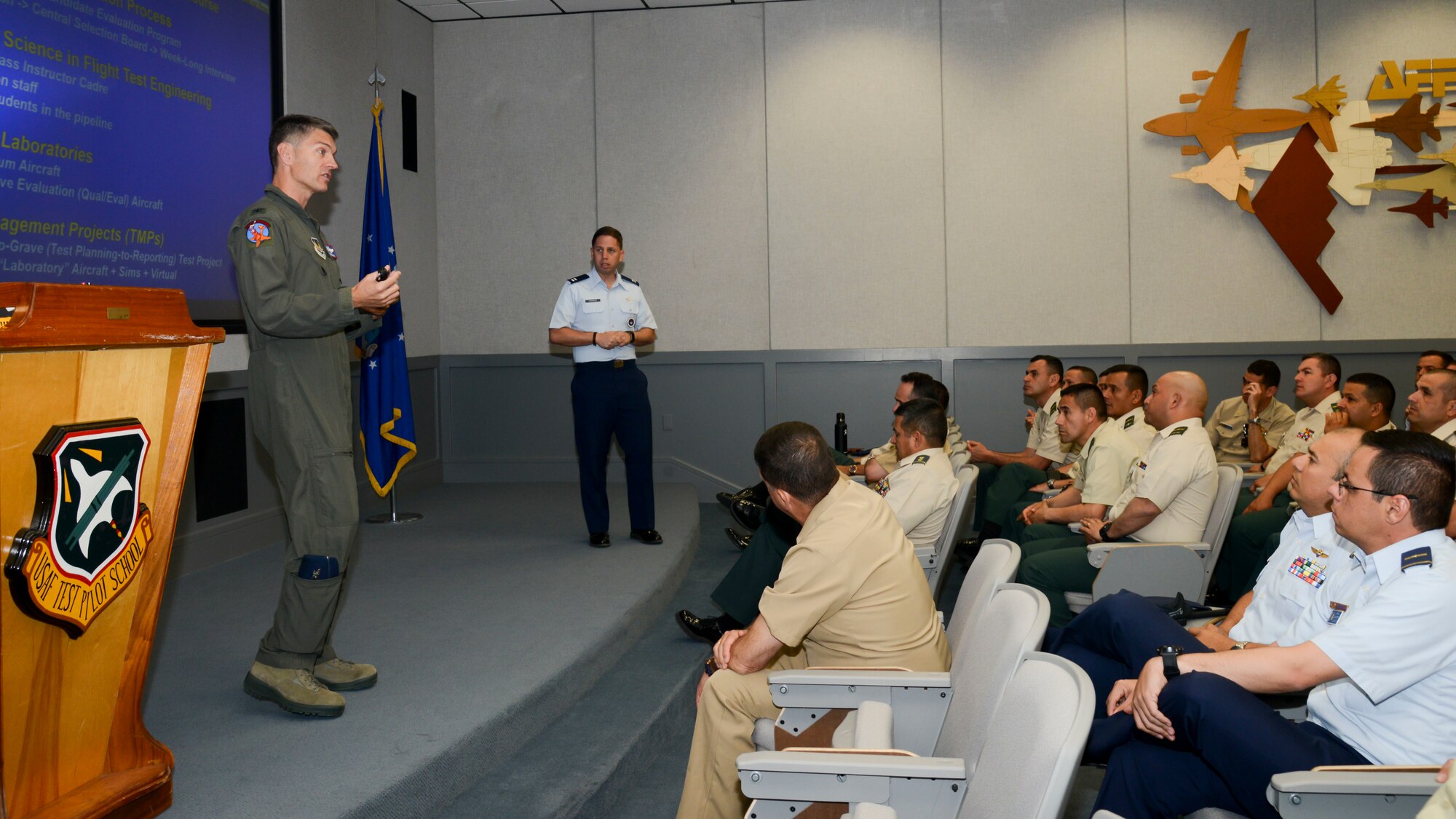 Members of the Colombian and Brazilian air forces check out an X-43 during their visit to the museum at Edwards Air Force Base, California, Sept. 10, 2018. During their visit, the delegation received briefs on the overall mission of Edwards and toured various base facilities. (U.S. Air Force photo by Giancarlo Casem)