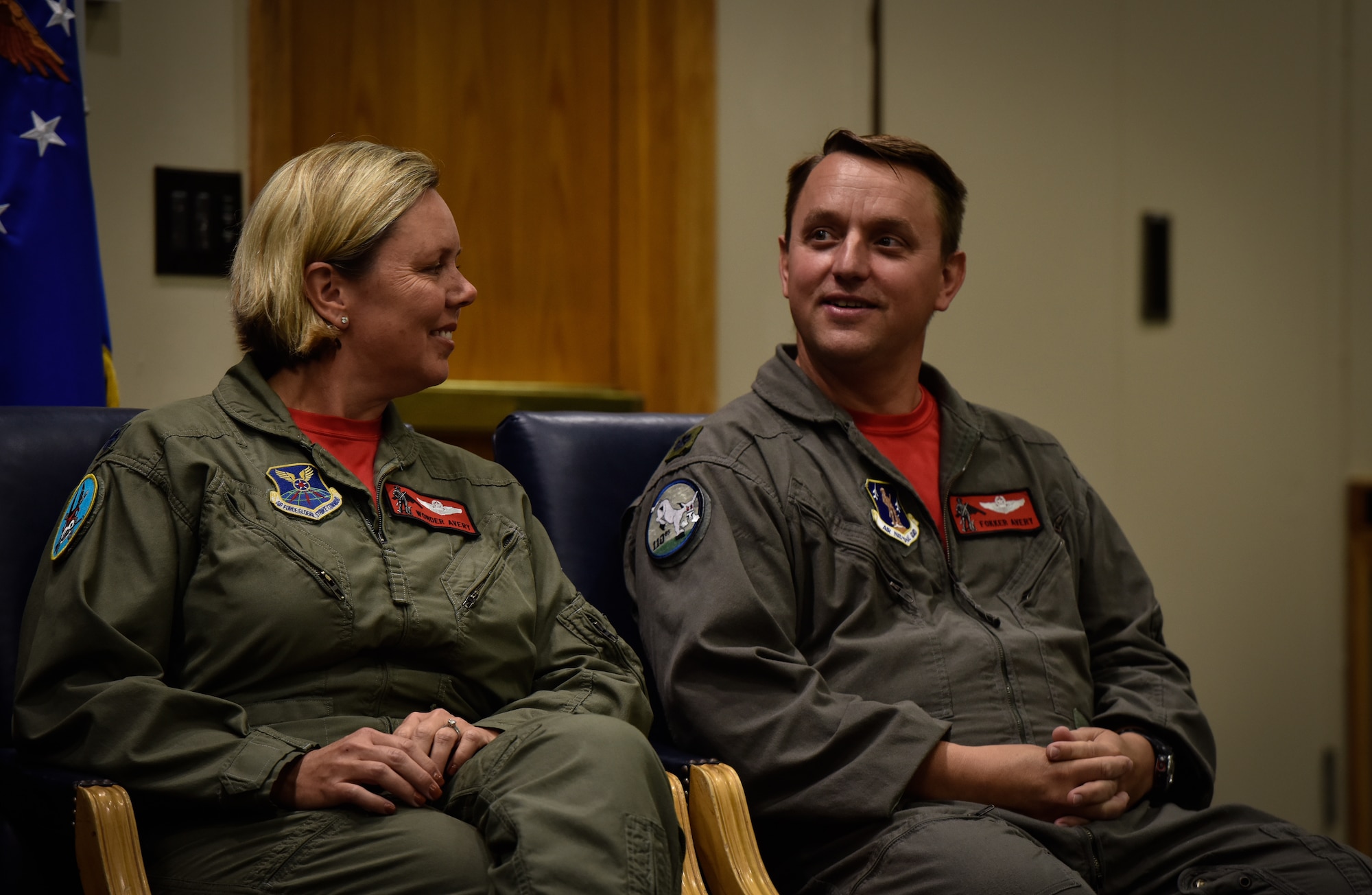 (From left) Lt. Cols. Jennifer and John Avery sit together during their retirement ceremony Sept. 7, 2018 at Whiteman Air Force Base, Missouri. The Averys were the first husband-wife team to fly the B-2. The couple served with the 509th Bomb Wing at Whiteman Air Force Base and then with the base’s Missouri National Guard 131st Bomb Wing. (U.S. Air Force photo by Tech. Sgt. Alexander W. Riedel)