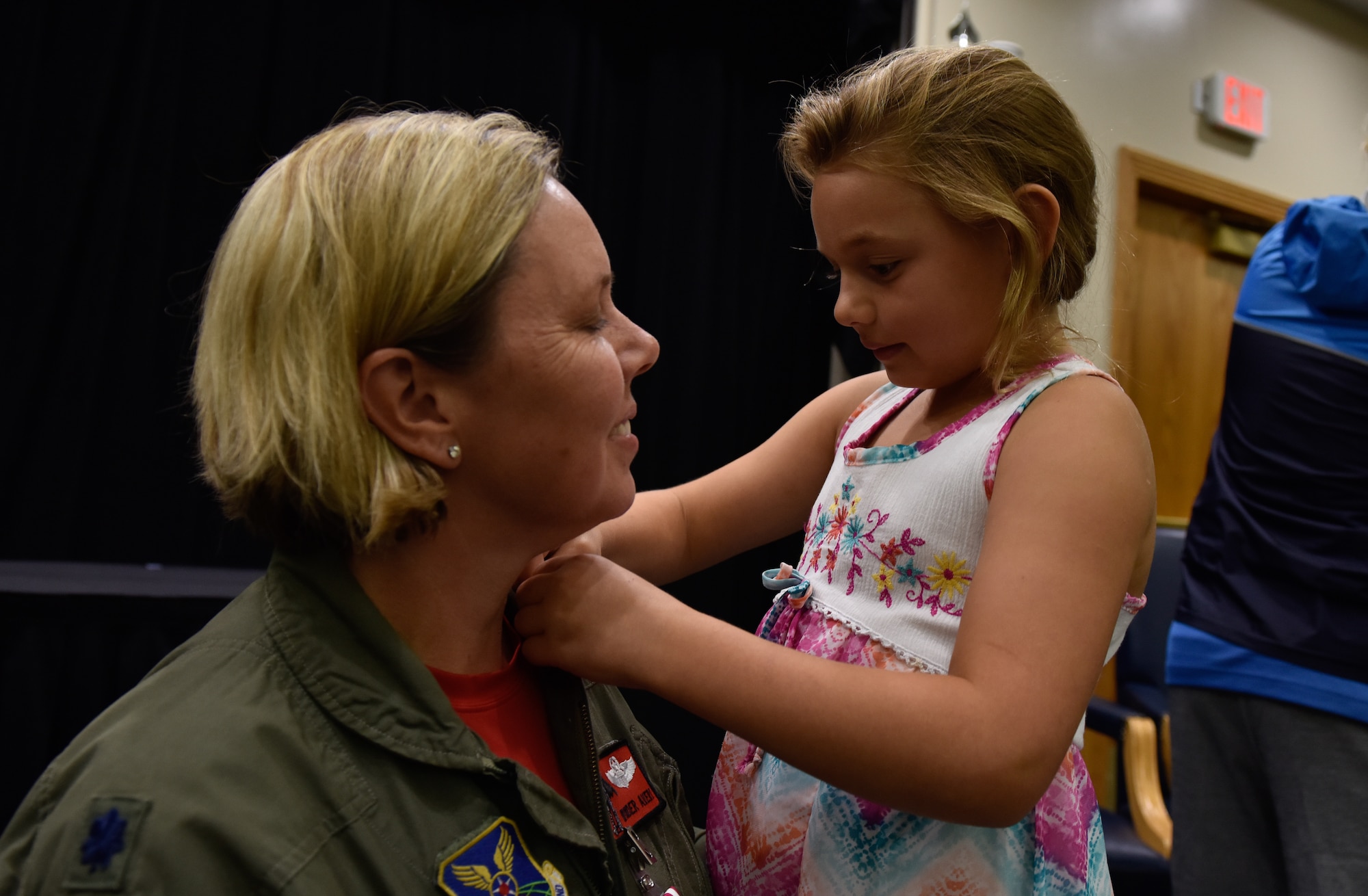 U.S. Air Force Lt. Col. Jennifer Avery receives her retirement pin from her daughter Elizabeth during a retirement ceremony Sept. 7, 2018, at Whiteman Air Force Base, Missouri. Avery was the first female to the fly the B-2 Spirit. She is the first and only female to fly stealth bomber in combat, and was also the first female to fly the B-1 in combat. She retired from the Air National Guard's 131st Bomb Wing.(U.S. Air Force photo by Tech. Sgt. Alexander W. Riedel)
