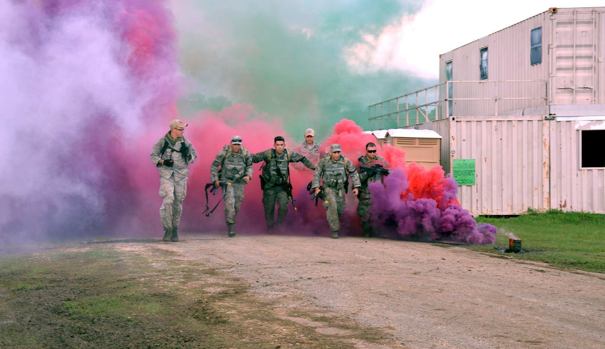 The Air Force Reserve Command Defender Challenge team and event cadre run to the finish line to complete the first day’s competition Sept. 11, 2018 at Camp Bullis Military Training Reservation, Texas.