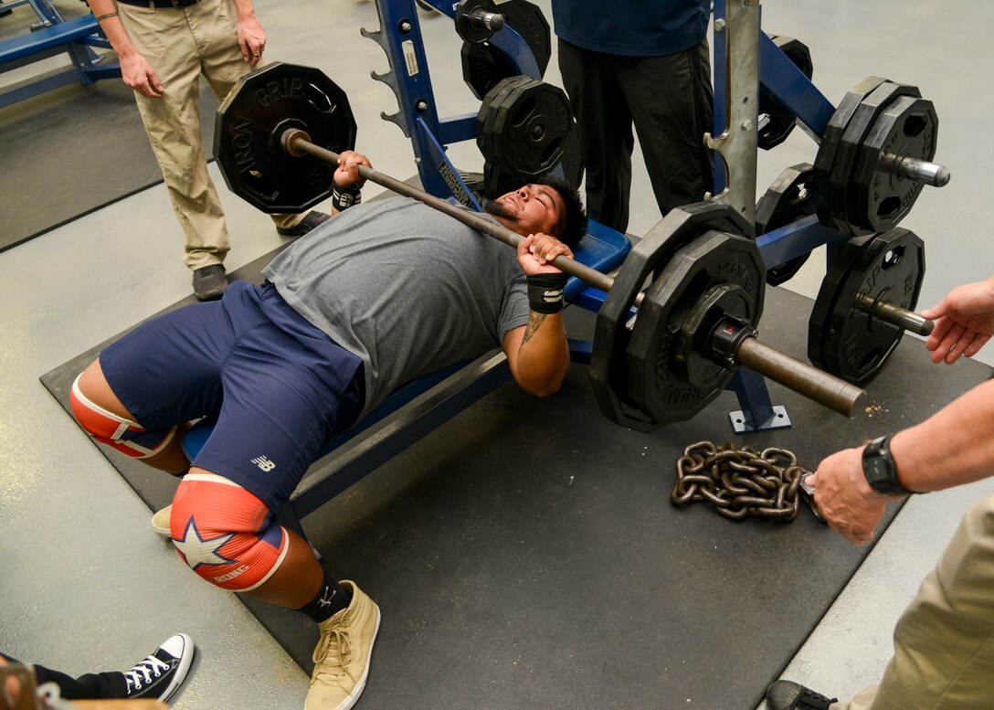 Compeitive powerlifter Andres Uriel competes in the squat portion of a powerlifting competition at the Rosburg Fitness Center on Edwards Air Force Base, California, Sept. 13, 2018. (U.S. Air Force photo by Giancarlo Casem